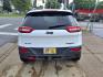 2015 Bright White Clear Coat Jeep Cherokee Trailhawk (1C4PJMBSXFW) with an 3.2L 3.2L V6 271hp 239ft. lbs. Sequential Multiport Fuel Injection engine, 4WD 9-Speed Shiftable Automatic transmission, located at 5505 N. Summit St., Toledo, OH, 43611, (419) 729-2688, 41.654953, -83.530014 - Photo#24