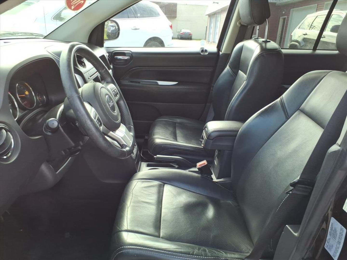 2017 Black Clear Coat Jeep Compass Sport (1C4NJDAB5HD) with an 2.4L 2.4L I4 172hp 165ft. lbs. Sequential Multiport Fuel Injection engine, 6-Speed Shiftable Automatic transmission, located at 5505 N. Summit St., Toledo, OH, 43611, (419) 729-2688, 41.654953, -83.530014 - Photo#2