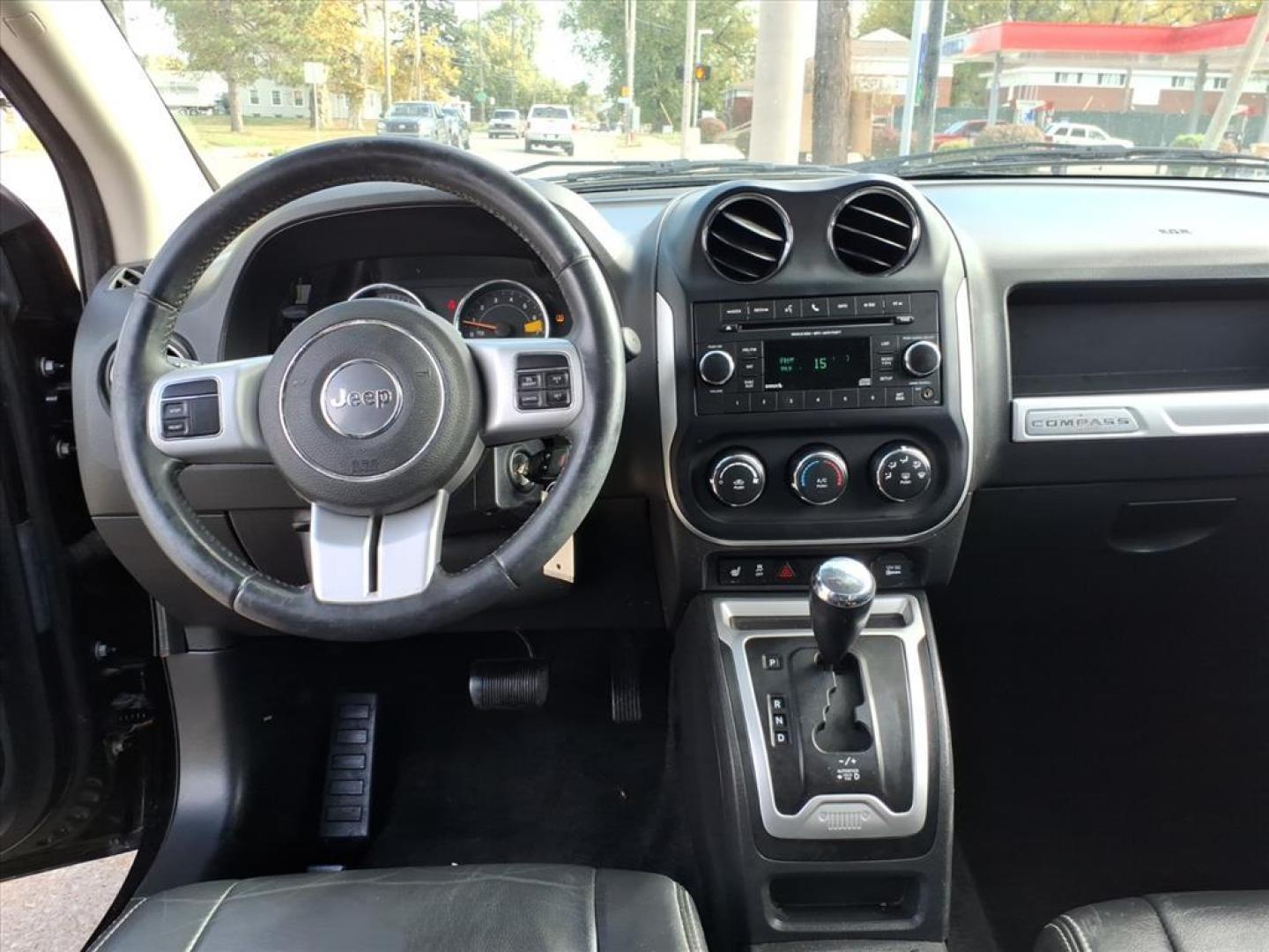 2017 Black Clear Coat Jeep Compass Sport (1C4NJDAB5HD) with an 2.4L 2.4L I4 172hp 165ft. lbs. Sequential Multiport Fuel Injection engine, 6-Speed Shiftable Automatic transmission, located at 5505 N. Summit St., Toledo, OH, 43611, (419) 729-2688, 41.654953, -83.530014 - Photo#5