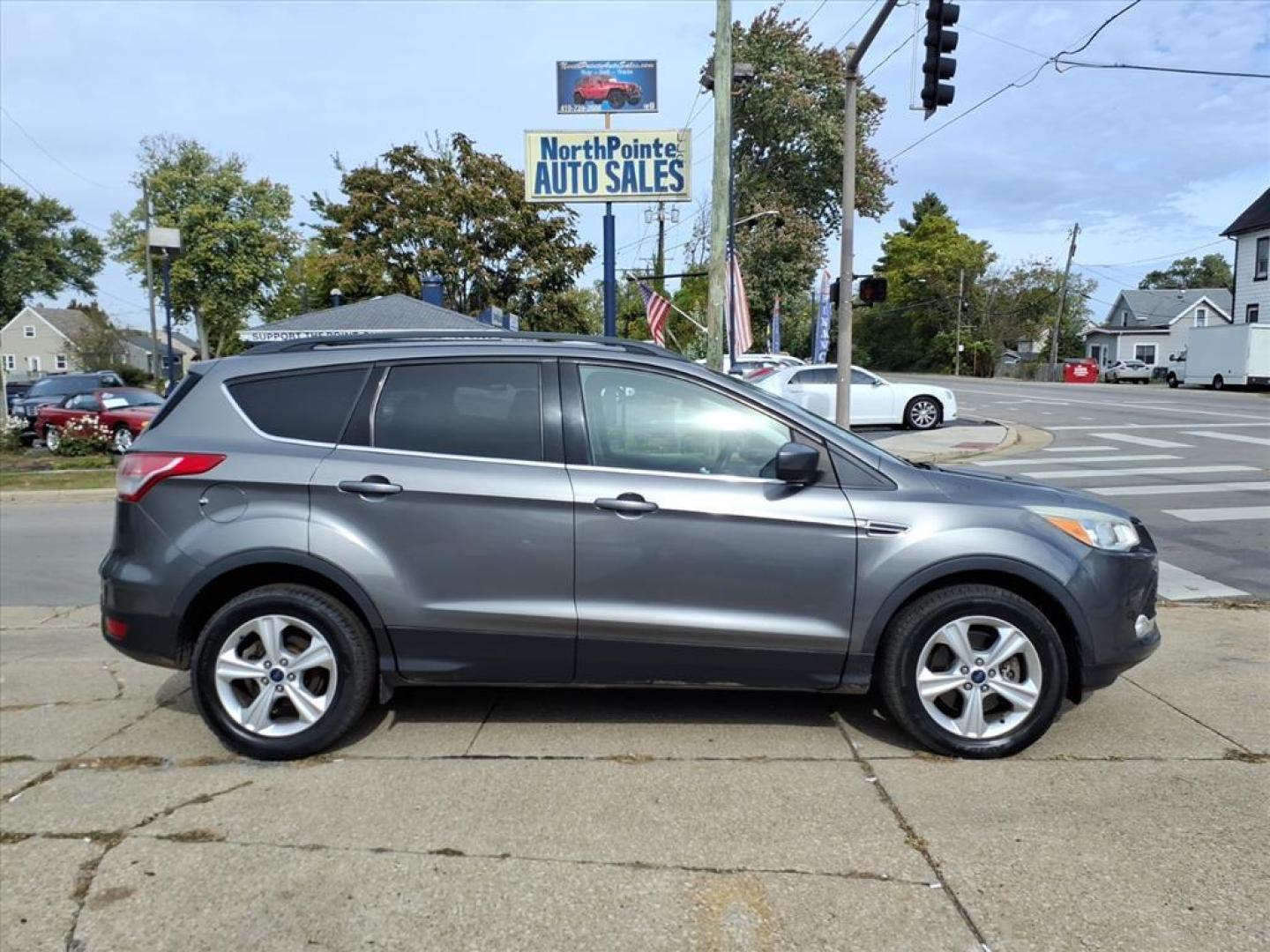 2014 Sterling Gray Metallic Ford Escape SE (1FMCU9G93EU) with an 2.0L EcoBoost 2.0L Turbo I4 240hp 270ft. lbs. Direct Injection engine, 6-Speed Shiftable Automatic transmission, located at 5505 N. Summit St., Toledo, OH, 43611, (419) 729-2688, 41.654953, -83.530014 - Photo#0
