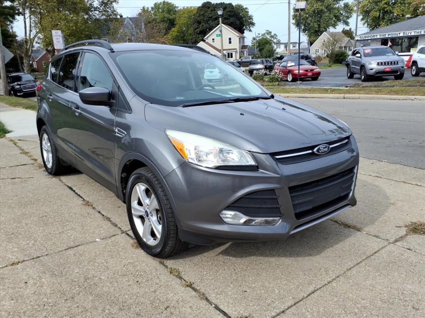 2014 Sterling Gray Metallic Ford Escape SE (1FMCU9G93EU) with an 2.0L EcoBoost 2.0L Turbo I4 240hp 270ft. lbs. Direct Injection engine, 6-Speed Shiftable Automatic transmission, located at 5505 N. Summit St., Toledo, OH, 43611, (419) 729-2688, 41.654953, -83.530014 - Photo#19