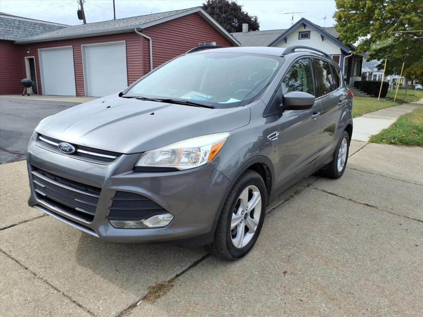 2014 Sterling Gray Metallic Ford Escape SE (1FMCU9G93EU) with an 2.0L EcoBoost 2.0L Turbo I4 240hp 270ft. lbs. Direct Injection engine, 6-Speed Shiftable Automatic transmission, located at 5505 N. Summit St., Toledo, OH, 43611, (419) 729-2688, 41.654953, -83.530014 - Photo#21