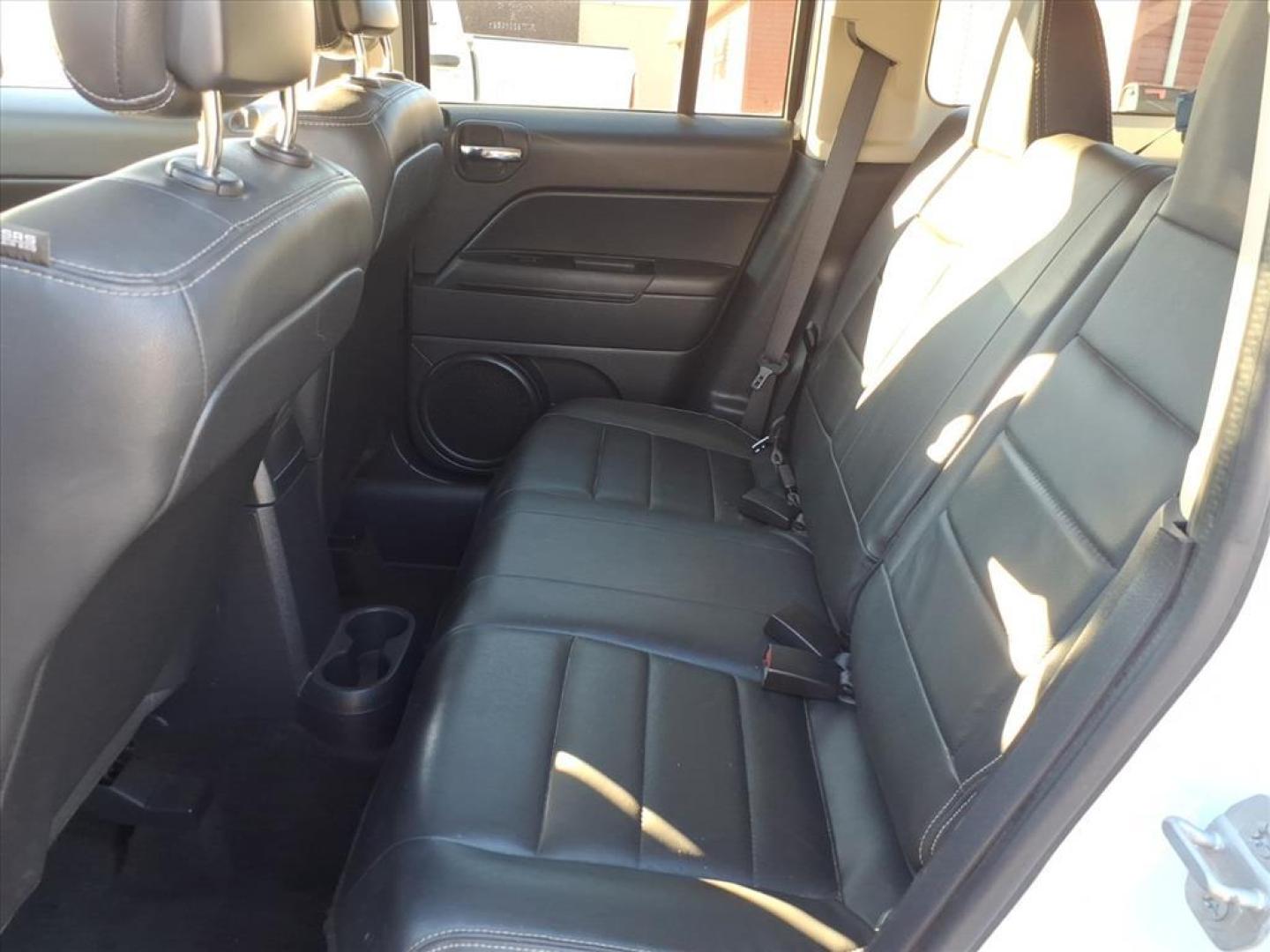 2015 Bright White Clear Coat Jeep Patriot High Altitude Edition (1C4NJRFB9FD) with an 2.4L 2.4L I4 172hp 165ft. lbs. Sequential Multiport Fuel Injection engine, 6-Speed Shiftable Automatic transmission, located at 5505 N. Summit St., Toledo, OH, 43611, (419) 729-2688, 41.654953, -83.530014 - Photo#3