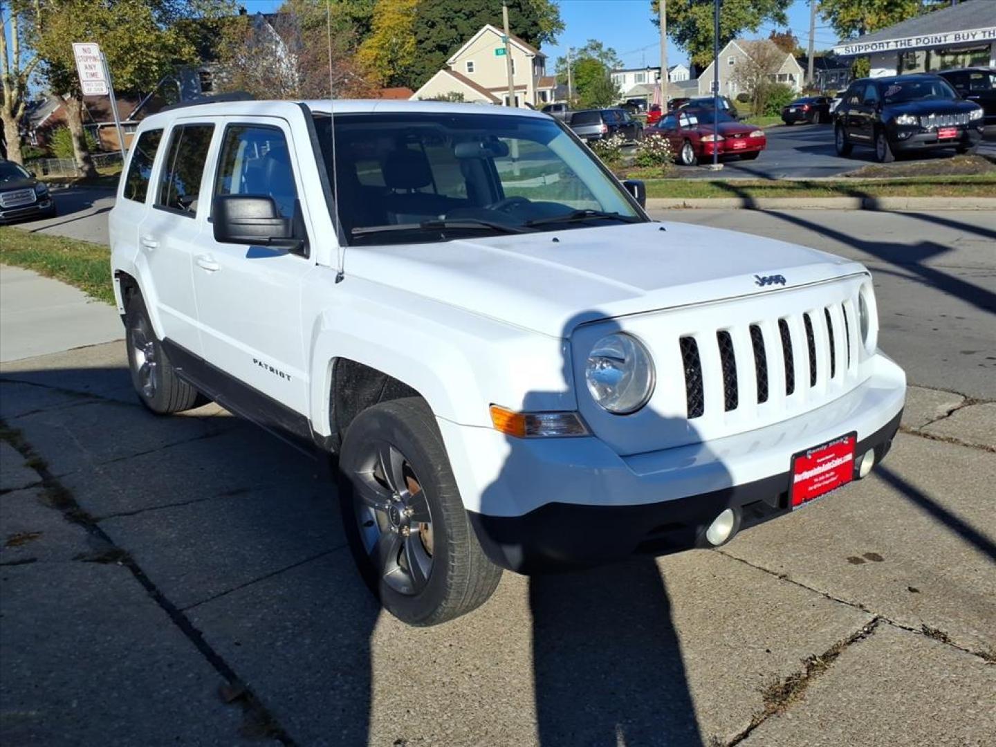 2015 Bright White Clear Coat Jeep Patriot High Altitude Edition (1C4NJRFB9FD) with an 2.4L 2.4L I4 172hp 165ft. lbs. Sequential Multiport Fuel Injection engine, 6-Speed Shiftable Automatic transmission, located at 5505 N. Summit St., Toledo, OH, 43611, (419) 729-2688, 41.654953, -83.530014 - Photo#14