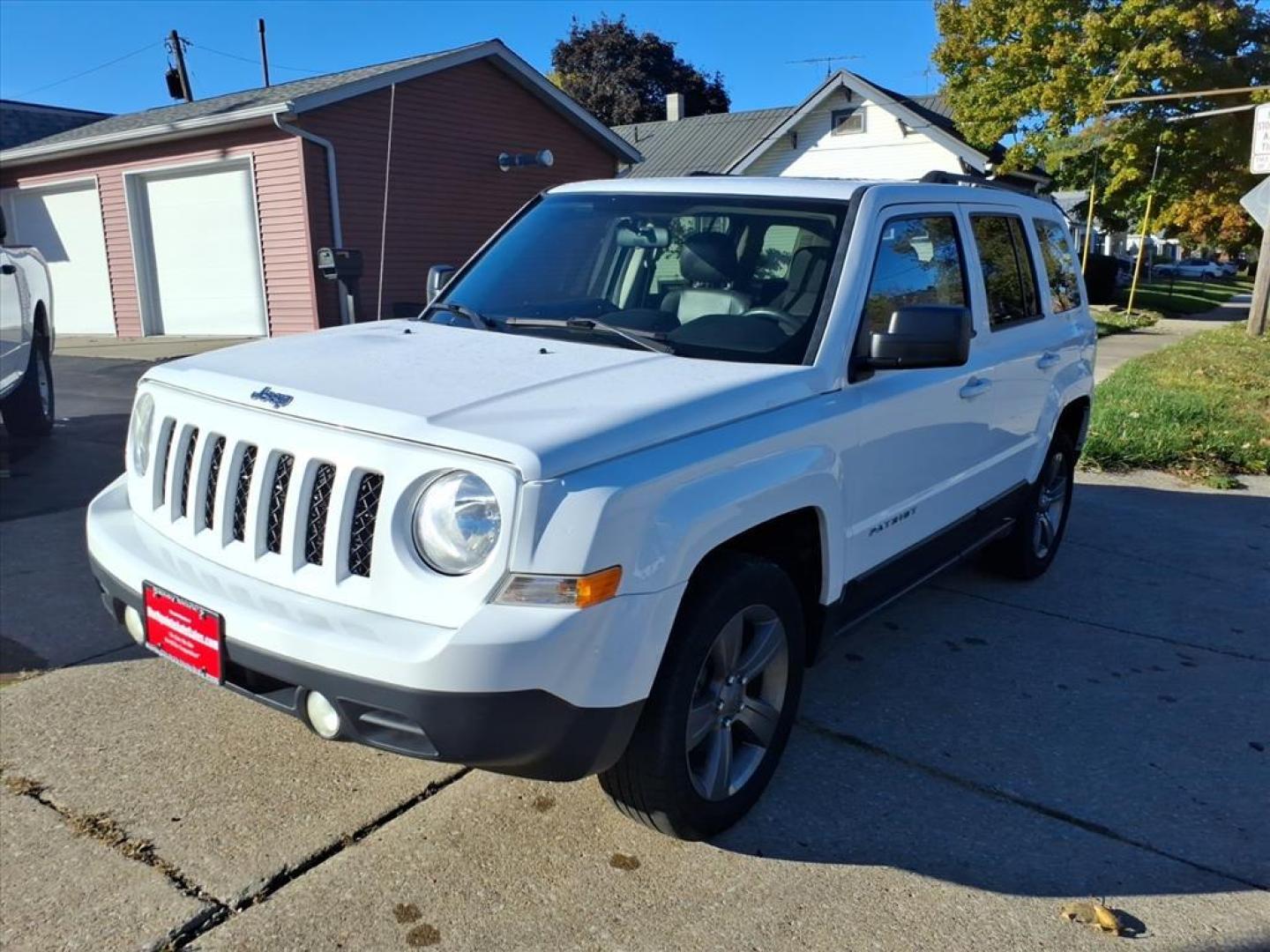 2015 Bright White Clear Coat Jeep Patriot High Altitude Edition (1C4NJRFB9FD) with an 2.4L 2.4L I4 172hp 165ft. lbs. Sequential Multiport Fuel Injection engine, 6-Speed Shiftable Automatic transmission, located at 5505 N. Summit St., Toledo, OH, 43611, (419) 729-2688, 41.654953, -83.530014 - Photo#16
