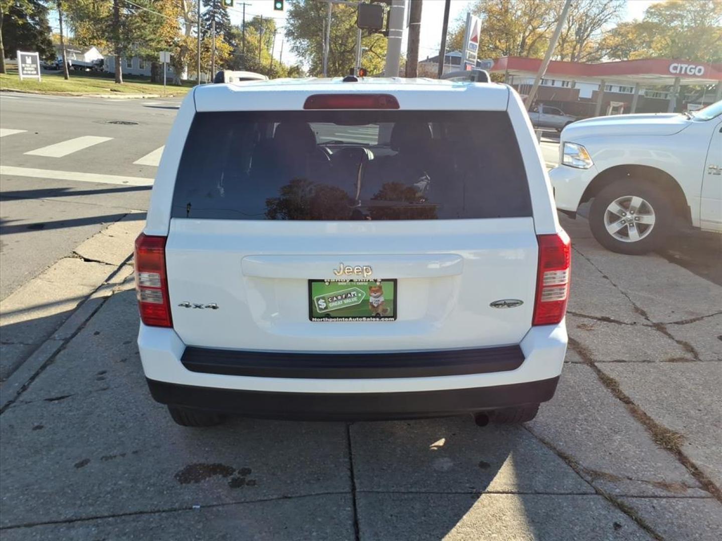 2015 Bright White Clear Coat Jeep Patriot High Altitude Edition (1C4NJRFB9FD) with an 2.4L 2.4L I4 172hp 165ft. lbs. Sequential Multiport Fuel Injection engine, 6-Speed Shiftable Automatic transmission, located at 5505 N. Summit St., Toledo, OH, 43611, (419) 729-2688, 41.654953, -83.530014 - Photo#19