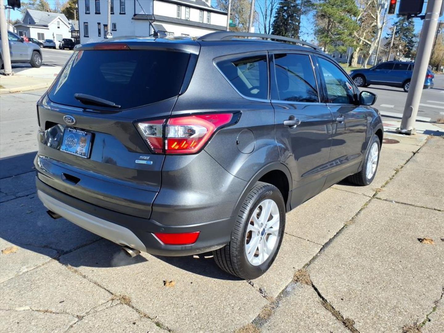 2017 Magnetic Ford Escape SE (1FMCU9GD4HU) with an 1.5L EcoBoost 1.5L Turbo I4 179hp 177ft. lbs. Direct Injection engine, 6-Speed Shiftable Automatic transmission, located at 5505 N. Summit St., Toledo, OH, 43611, (419) 729-2688, 41.654953, -83.530014 - Photo#24