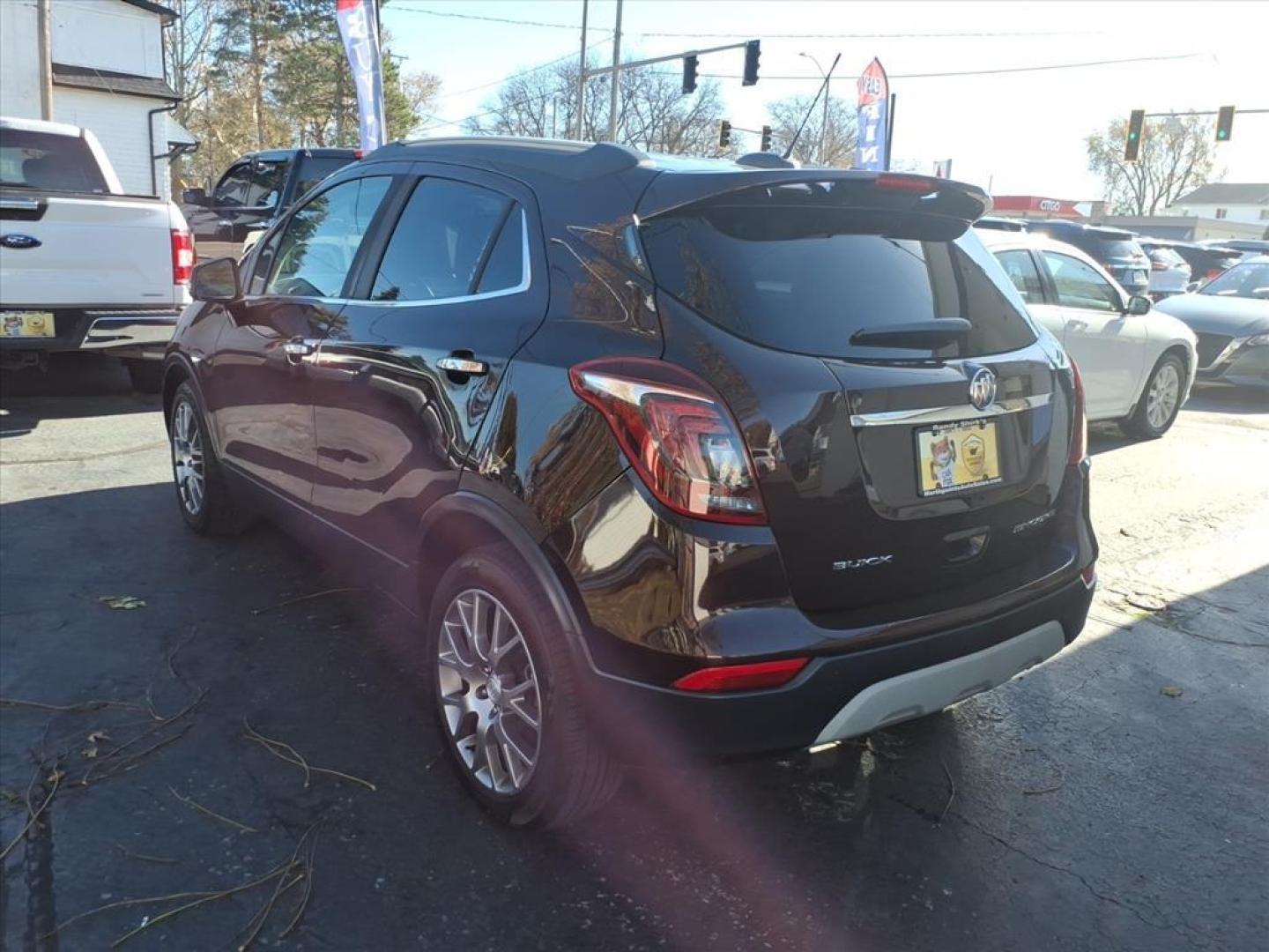 2018 Black Cherry Metallic Buick Encore Sport Touring (KL4CJ1SB7JB) with an 1.4L Ecotec 1.4L Turbo I4 138hp 148ft. lbs. Sequential Multiport Fuel Injection engine, 6-Speed Automatic w/Driver Shift Control transmission, located at 5505 N. Summit St., Toledo, OH, 43611, (419) 729-2688, 41.654953, -83.530014 - Photo#5
