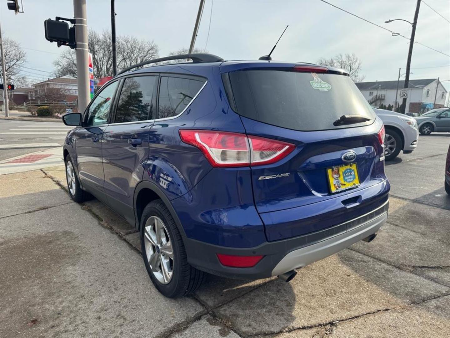 2016 Deep Impact Blue Ford Escape SE (1FMCU0GX4GU) with an 1.6L EcoBoost 1.6L Turbo I4 178hp 184ft. lbs. Direct Injection engine, 6-Speed Shiftable Automatic transmission, located at 5505 N. Summit St., Toledo, OH, 43611, (419) 729-2688, 41.654953, -83.530014 - Photo#21