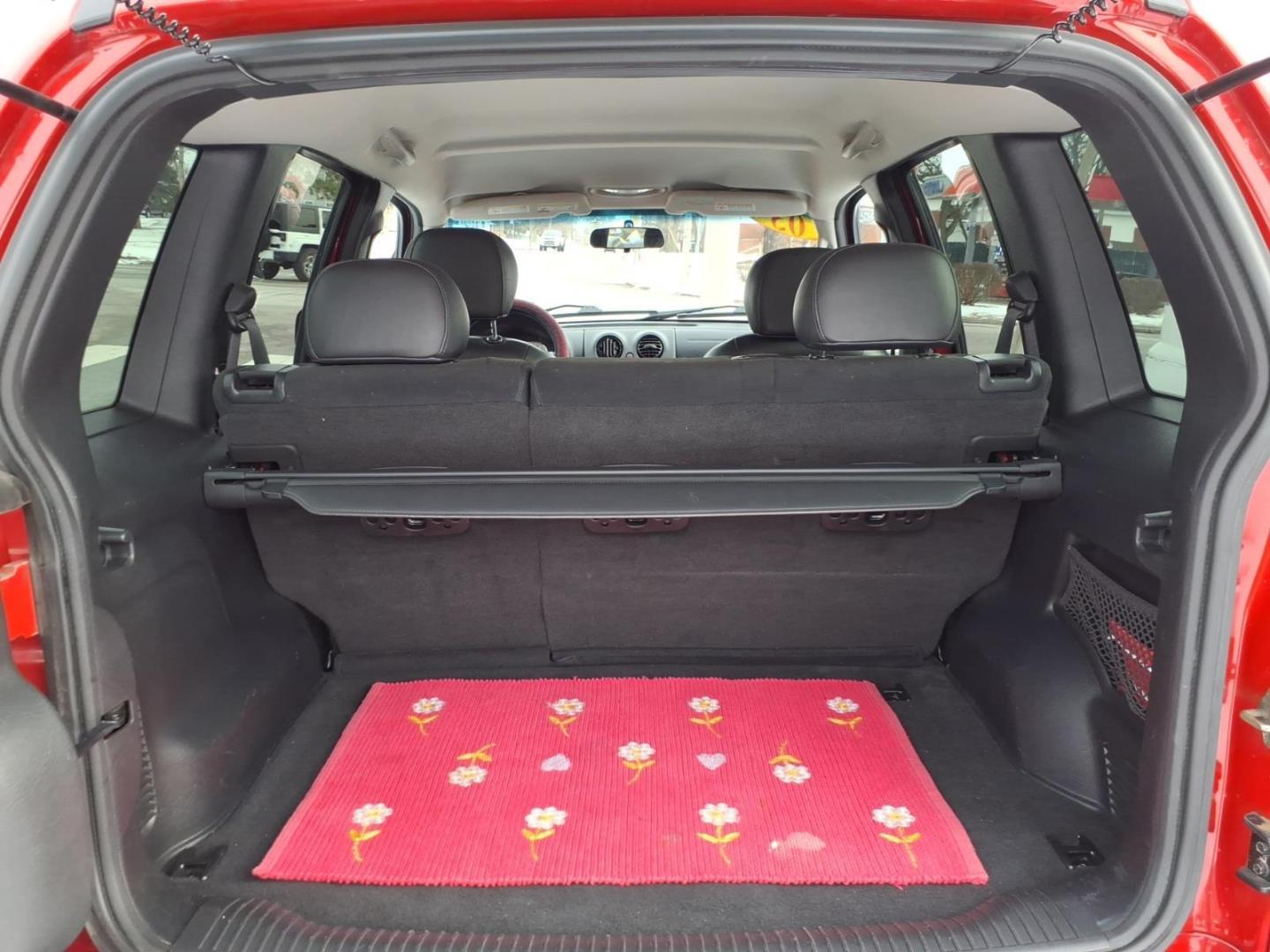 2003 Flame Red Clearcoat Pr4 Jeep Liberty Limited (1J4GL58K73W) with an 3.7L 3.7L V6 210hp 235ft. lbs. Fuel Injected engine, 4-Speed Automatic transmission, located at 5505 N. Summit St., Toledo, OH, 43611, (419) 729-2688, 41.654953, -83.530014 - Photo#12