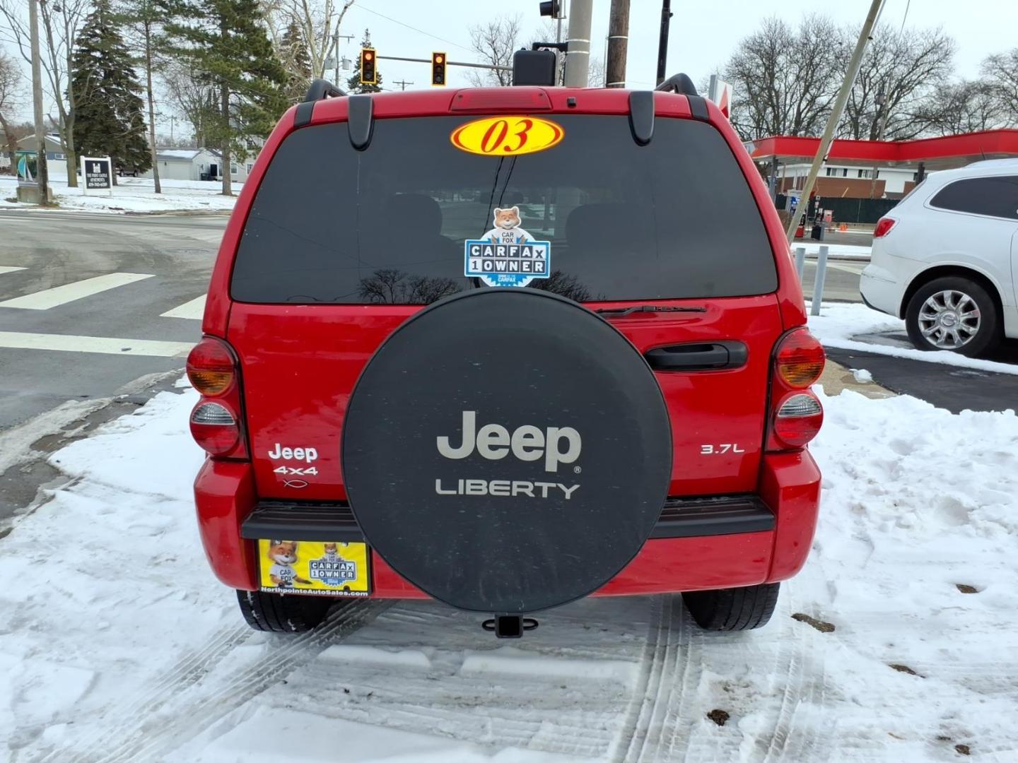 2003 Flame Red Clearcoat Pr4 Jeep Liberty Limited (1J4GL58K73W) with an 3.7L 3.7L V6 210hp 235ft. lbs. Fuel Injected engine, 4-Speed Automatic transmission, located at 5505 N. Summit St., Toledo, OH, 43611, (419) 729-2688, 41.654953, -83.530014 - Photo#19