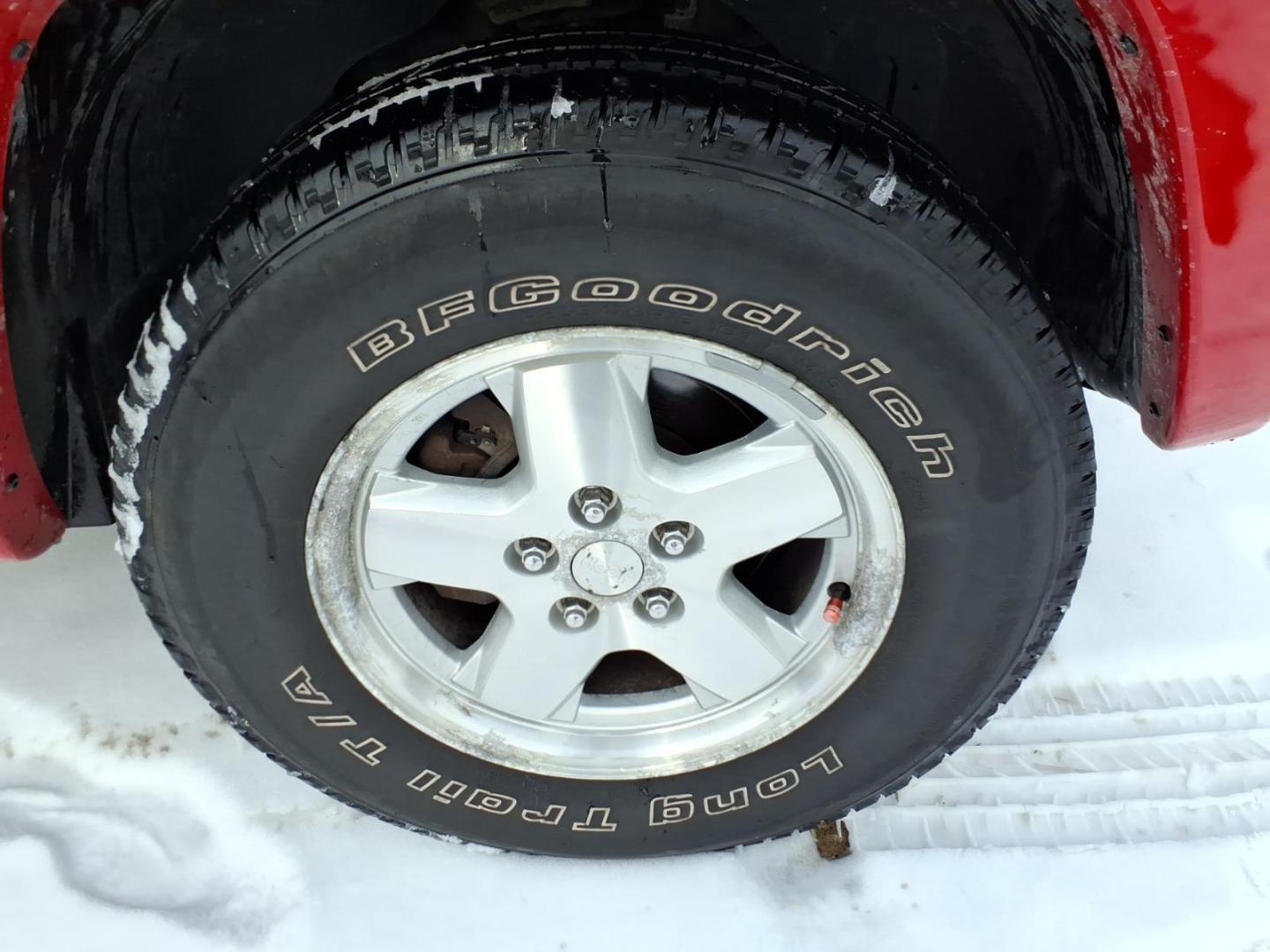 2003 Flame Red Clearcoat Pr4 Jeep Liberty Limited (1J4GL58K73W) with an 3.7L 3.7L V6 210hp 235ft. lbs. Fuel Injected engine, 4-Speed Automatic transmission, located at 5505 N. Summit St., Toledo, OH, 43611, (419) 729-2688, 41.654953, -83.530014 - Photo#22
