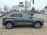 2019 Dk. Gray Ford Edge Titanium (2FMPK4K9XKB) with an 2.0L EcoBoost 2.0L Turbo I4 250hp 280ft. lbs. Direct Injection engine, 8-Speed Shiftable Automatic transmission, located at 5505 N. Summit St., Toledo, OH, 43611, (419) 729-2688, 41.654953, -83.530014 - Photo#0