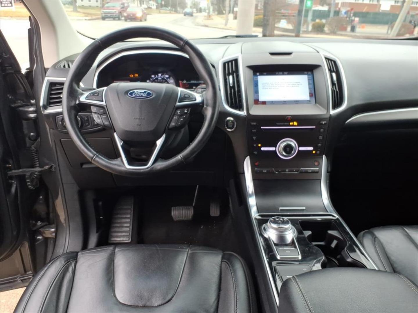 2019 Dk. Gray Ford Edge Titanium (2FMPK4K9XKB) with an 2.0L EcoBoost 2.0L Turbo I4 250hp 280ft. lbs. Direct Injection engine, 8-Speed Shiftable Automatic transmission, located at 5505 N. Summit St., Toledo, OH, 43611, (419) 729-2688, 41.654953, -83.530014 - Photo#4