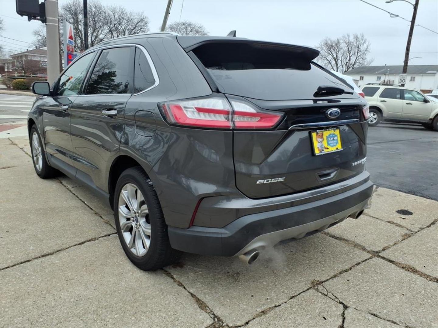 2019 Dk. Gray Ford Edge Titanium (2FMPK4K9XKB) with an 2.0L EcoBoost 2.0L Turbo I4 250hp 280ft. lbs. Direct Injection engine, 8-Speed Shiftable Automatic transmission, located at 5505 N. Summit St., Toledo, OH, 43611, (419) 729-2688, 41.654953, -83.530014 - Photo#23