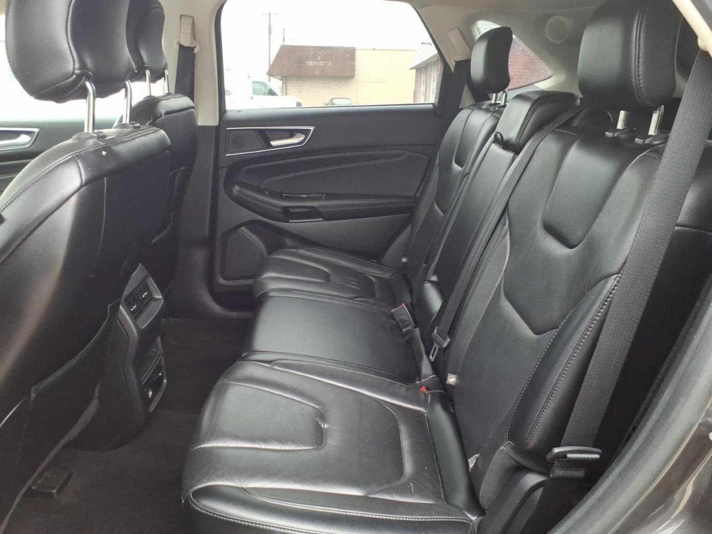 2019 Dk. Gray Ford Edge Titanium (2FMPK4K9XKB) with an 2.0L EcoBoost 2.0L Turbo I4 250hp 280ft. lbs. Direct Injection engine, 8-Speed Shiftable Automatic transmission, located at 5505 N. Summit St., Toledo, OH, 43611, (419) 729-2688, 41.654953, -83.530014 - Photo#3