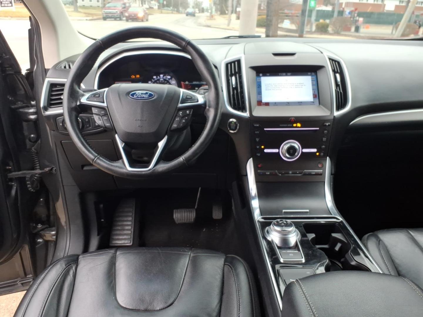 2019 Dk. Gray Ford Edge Titanium (2FMPK4K9XKB) with an 2.0L EcoBoost 2.0L Turbo I4 250hp 280ft. lbs. Direct Injection engine, 8-Speed Shiftable Automatic transmission, located at 5505 N. Summit St., Toledo, OH, 43611, (419) 729-2688, 41.654953, -83.530014 - Photo#4