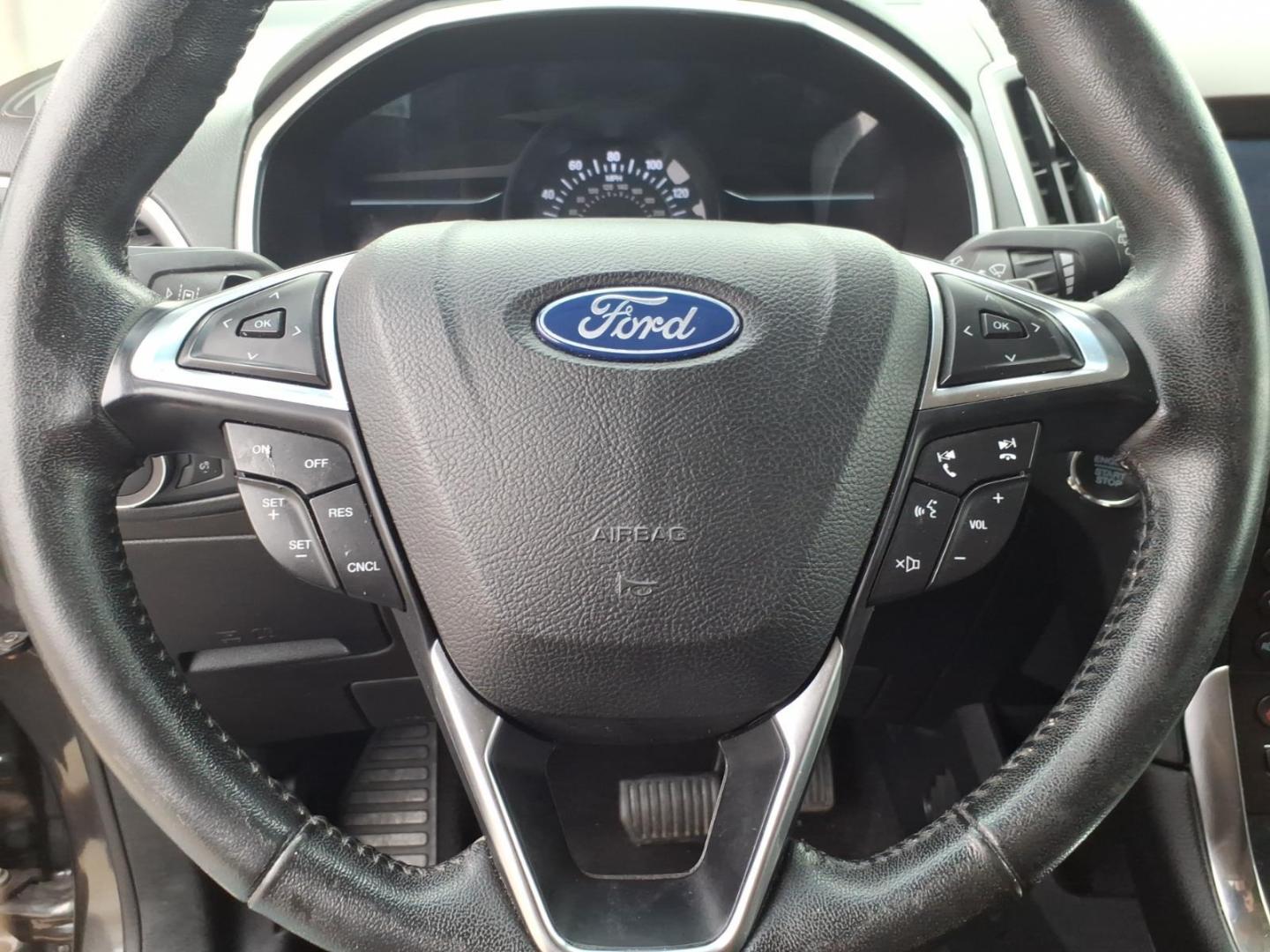 2019 Dk. Gray Ford Edge Titanium (2FMPK4K9XKB) with an 2.0L EcoBoost 2.0L Turbo I4 250hp 280ft. lbs. Direct Injection engine, 8-Speed Shiftable Automatic transmission, located at 5505 N. Summit St., Toledo, OH, 43611, (419) 729-2688, 41.654953, -83.530014 - Photo#8