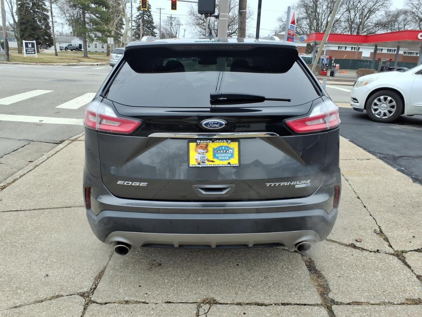 2019 Dk. Gray Ford Edge Titanium (2FMPK4K9XKB) with an 2.0L EcoBoost 2.0L Turbo I4 250hp 280ft. lbs. Direct Injection engine, 8-Speed Shiftable Automatic transmission, located at 5505 N. Summit St., Toledo, OH, 43611, (419) 729-2688, 41.654953, -83.530014 - Photo#24