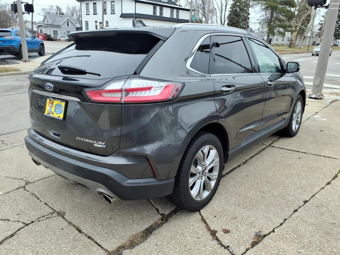 2019 Dk. Gray Ford Edge Titanium (2FMPK4K9XKB) with an 2.0L EcoBoost 2.0L Turbo I4 250hp 280ft. lbs. Direct Injection engine, 8-Speed Shiftable Automatic transmission, located at 5505 N. Summit St., Toledo, OH, 43611, (419) 729-2688, 41.654953, -83.530014 - Photo#25