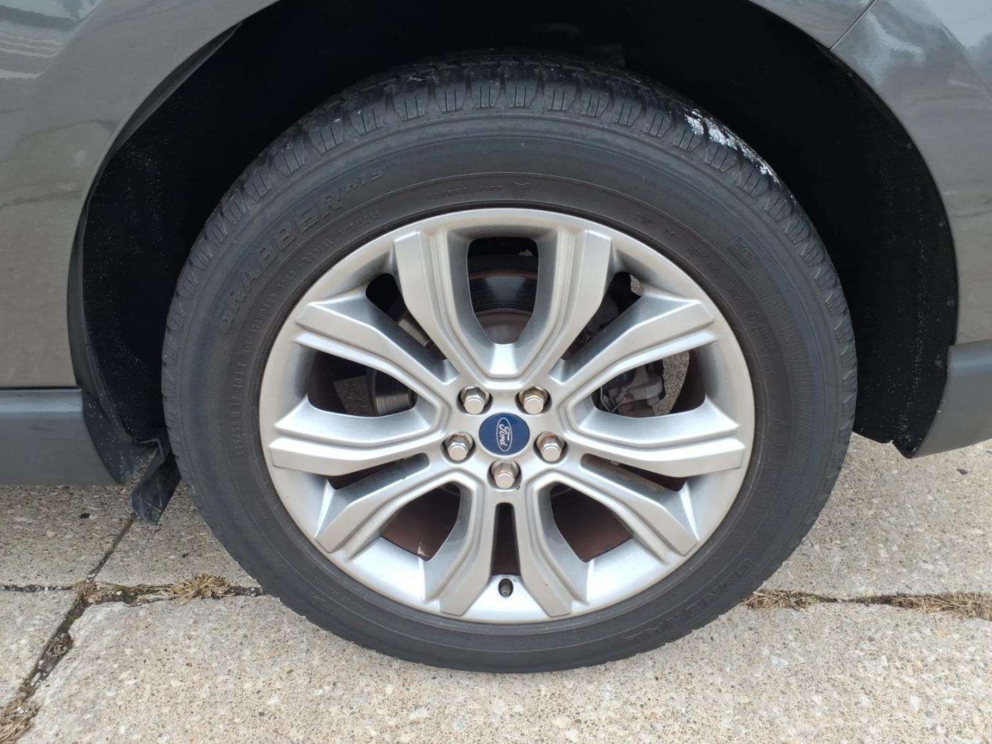 2019 Dk. Gray Ford Edge Titanium (2FMPK4K9XKB) with an 2.0L EcoBoost 2.0L Turbo I4 250hp 280ft. lbs. Direct Injection engine, 8-Speed Shiftable Automatic transmission, located at 5505 N. Summit St., Toledo, OH, 43611, (419) 729-2688, 41.654953, -83.530014 - Photo#29