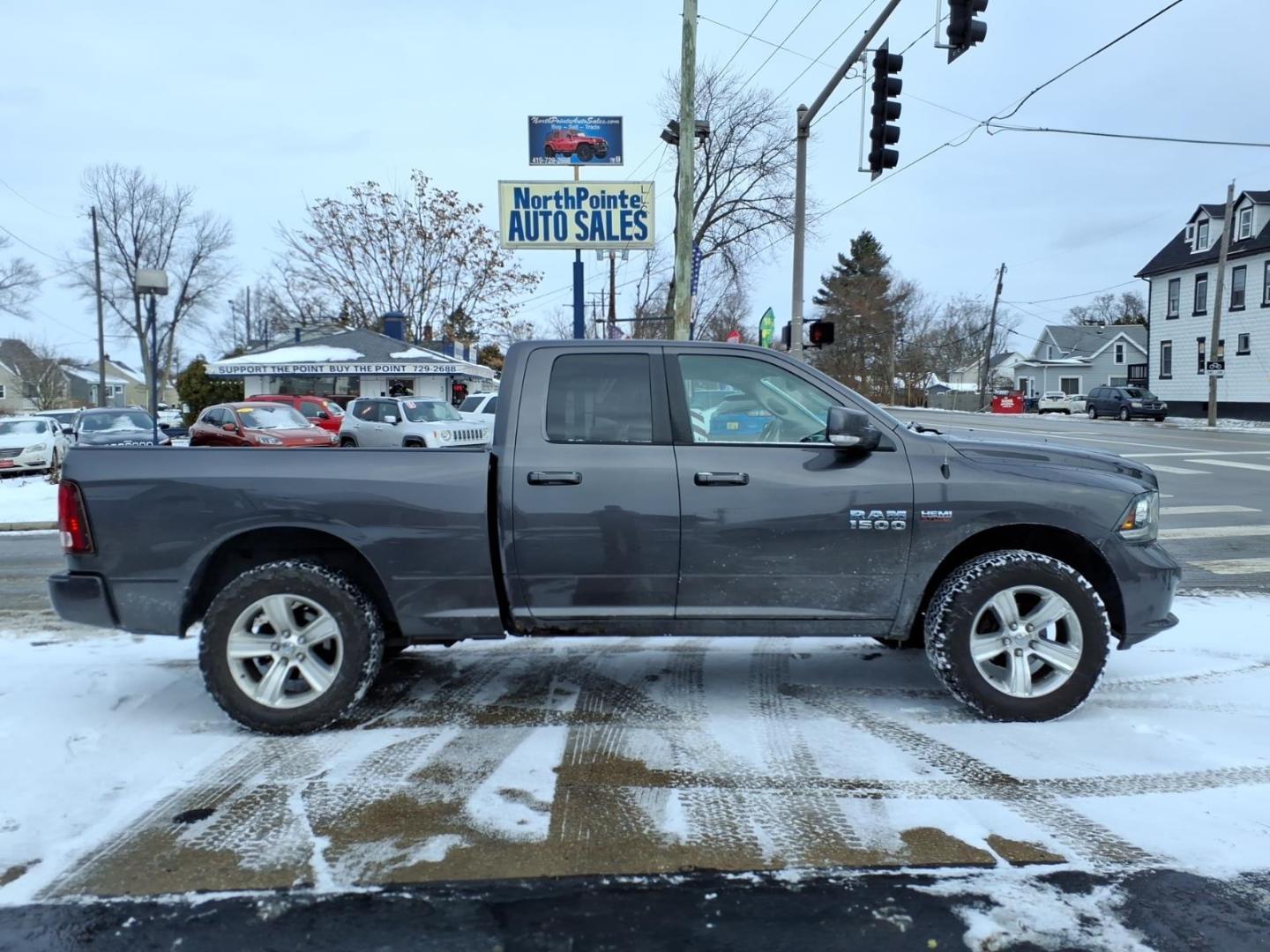 2016 Granite Crystal Metallic Clear Coat RAM 1500 Sport (1C6RR7HT0GS) with an 5.7L HEMI 5.7L V8 395hp 410ft. lbs. Sequential Multiport Fuel Injection engine, 8-Speed Shiftable Automatic transmission, located at 5505 N. Summit St., Toledo, OH, 43611, (419) 729-2688, 41.654953, -83.530014 - Photo#0