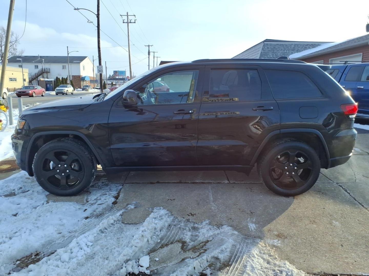 2019 Diamond Black Crystal Pearl Coat Jeep Grand Cherokee Laredo (1C4RJFAG4KC) with an 3.6L Pentastar 3.6L V6 295hp 260ft. lbs. Sequential Multiport Fuel Injection engine, 8-Speed Shiftable Automatic transmission, located at 5505 N. Summit St., Toledo, OH, 43611, (419) 729-2688, 41.654953, -83.530014 - Photo#22