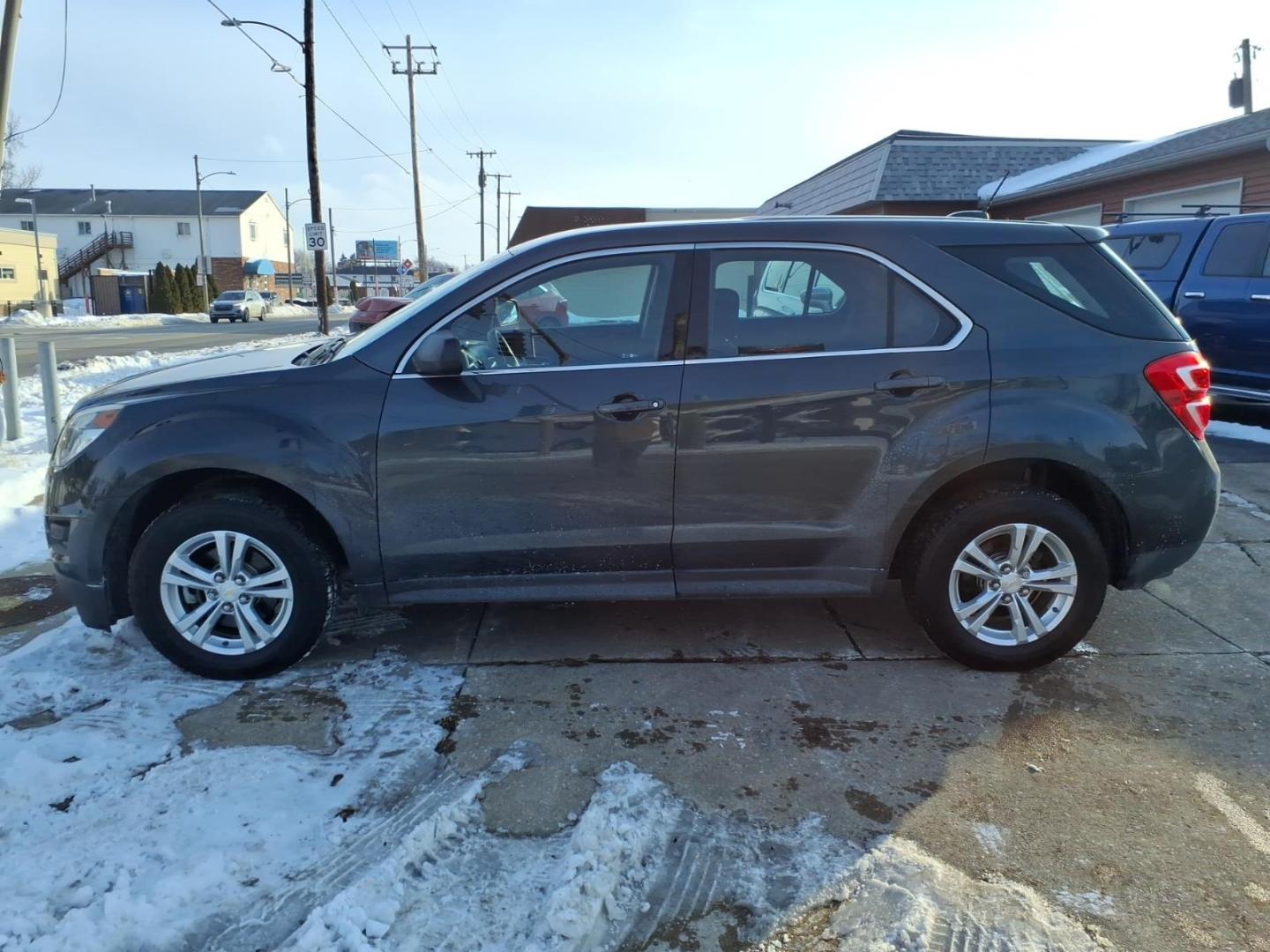 2017 Nightfall Gray Metallic Chevrolet Equinox LS (2GNALBEK9H1) with an 2.4L Ecotec 2.4L I4 182hp 172ft. lbs. Direct Injection engine, 6-Speed Shiftable Automatic transmission, located at 5505 N. Summit St., Toledo, OH, 43611, (419) 729-2688, 41.654953, -83.530014 - Photo#20