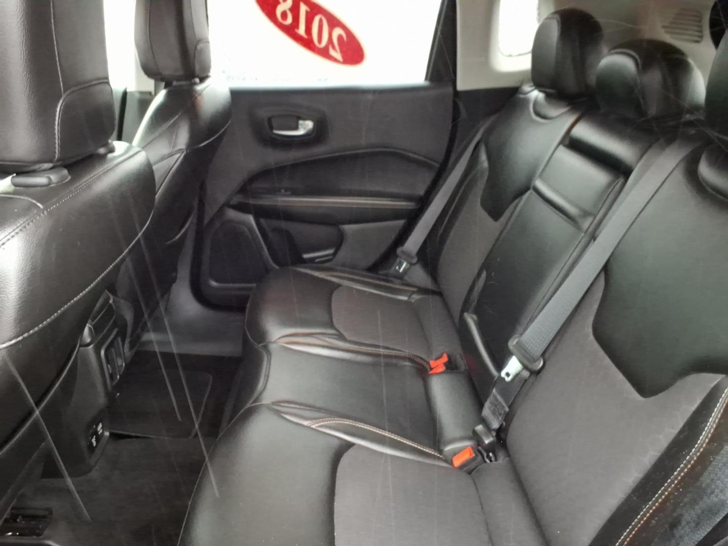 2018 Granite Crystal Metallic Clear Coat Jeep Compass Latitude (3C4NJCBB6JT) with an 2.4L Tigershark 2.4L I4 180hp 175ft. lbs. Sequential Multiport Fuel Injection engine, Aisin 6-Speed Automatic transmission, located at 5505 N. Summit St., Toledo, OH, 43611, (419) 729-2688, 41.654953, -83.530014 - Photo#4