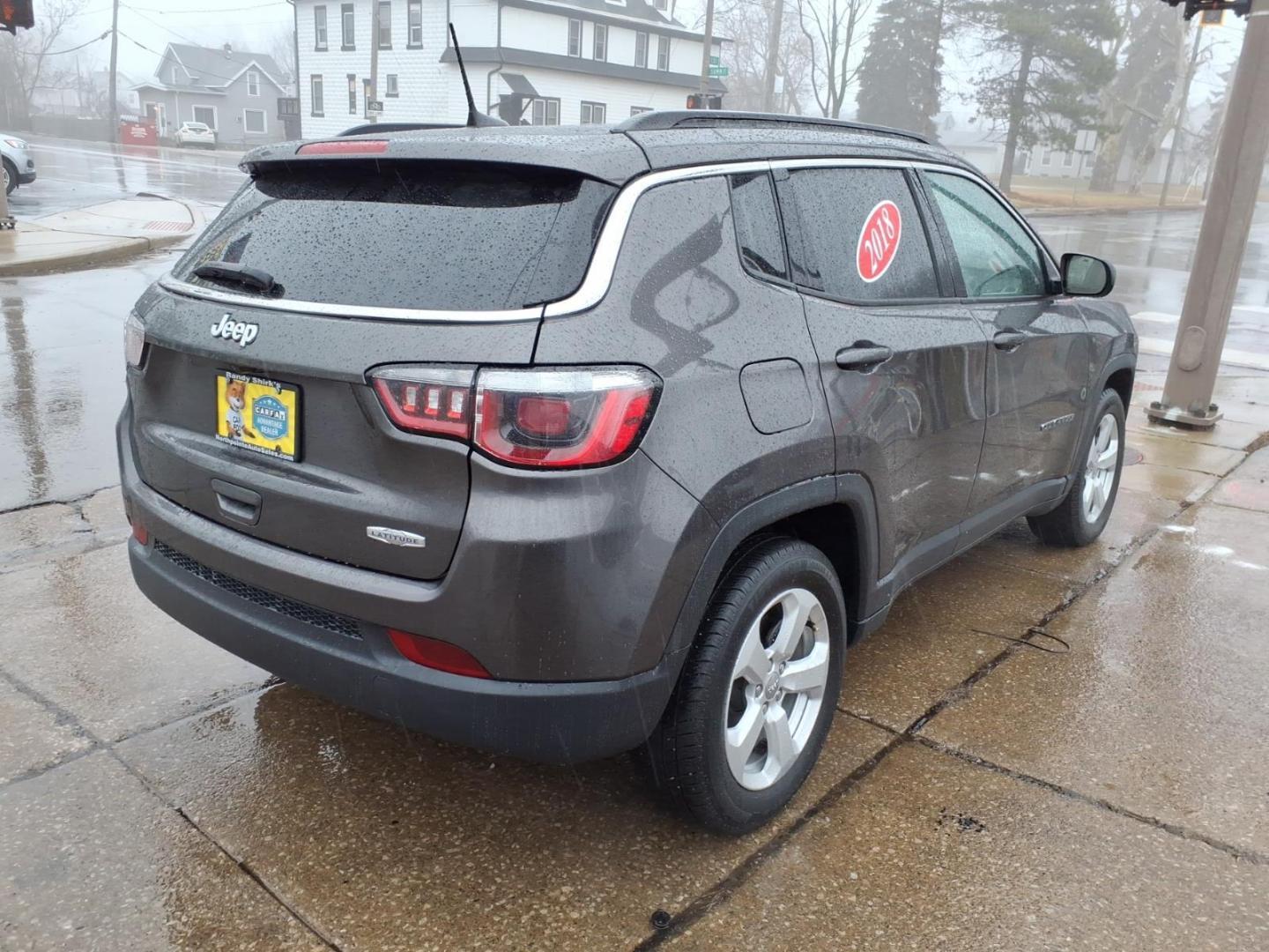 2018 Granite Crystal Metallic Clear Coat Jeep Compass Latitude (3C4NJCBB6JT) with an 2.4L Tigershark 2.4L I4 180hp 175ft. lbs. Sequential Multiport Fuel Injection engine, Aisin 6-Speed Automatic transmission, located at 5505 N. Summit St., Toledo, OH, 43611, (419) 729-2688, 41.654953, -83.530014 - Photo#25