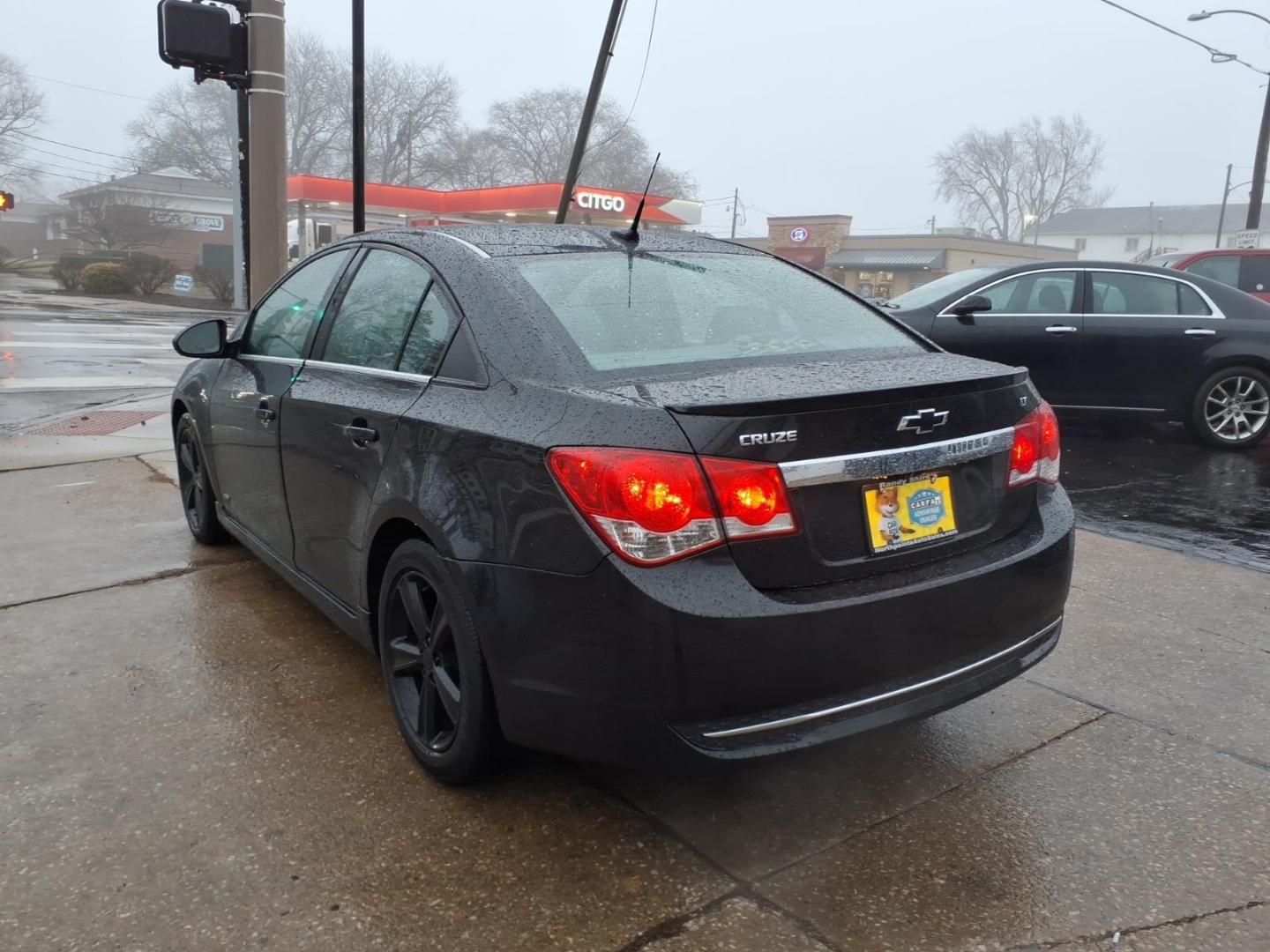 2014 Black Granite Metallic Chevrolet Cruze 2LT Auto (1G1PE5SB5E7) with an 1.4L Ecotec 1.4L Turbo I4 138hp 148ft. lbs. Sequential Multiport Fuel Injection engine, 6-Speed Shiftable Automatic transmission, located at 5505 N. Summit St., Toledo, OH, 43611, (419) 729-2688, 41.654953, -83.530014 - Photo#21