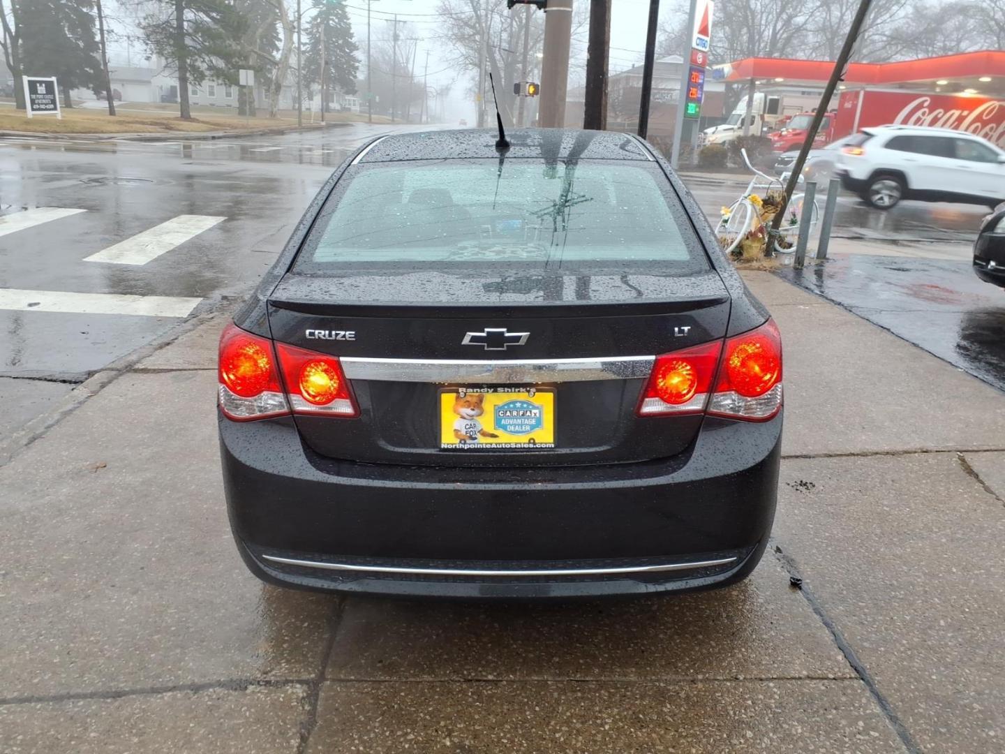 2014 Black Granite Metallic Chevrolet Cruze 2LT Auto (1G1PE5SB5E7) with an 1.4L Ecotec 1.4L Turbo I4 138hp 148ft. lbs. Sequential Multiport Fuel Injection engine, 6-Speed Shiftable Automatic transmission, located at 5505 N. Summit St., Toledo, OH, 43611, (419) 729-2688, 41.654953, -83.530014 - Photo#22