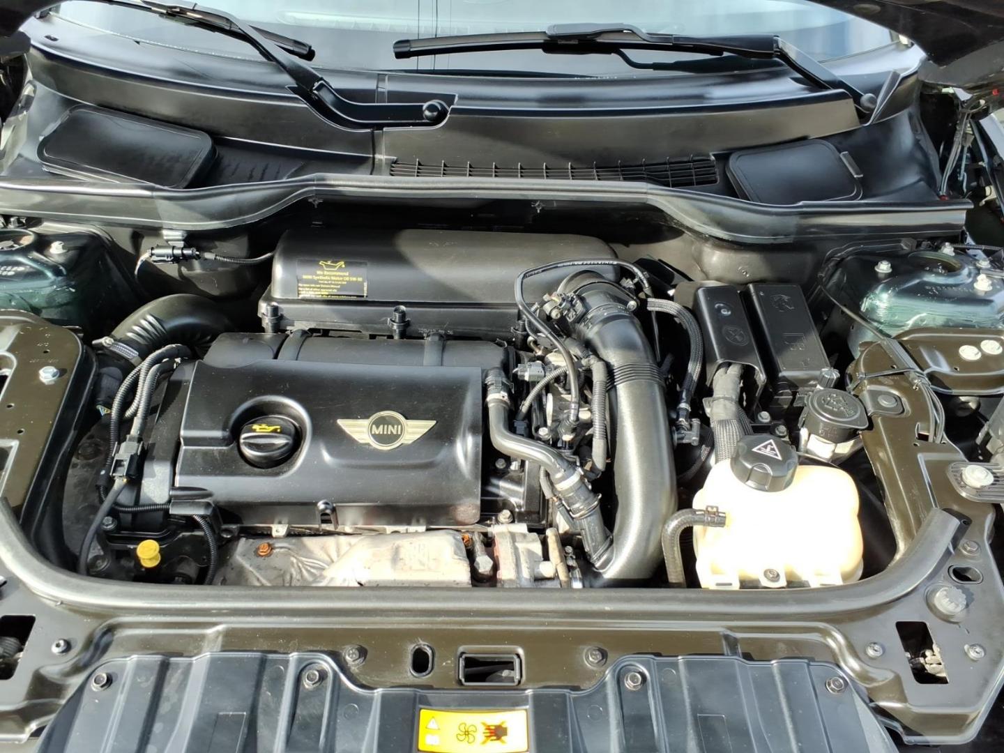 2013 Oxford Green Metallic MINI Countryman Cooper S ALL4 (WMWZC5C59DW) with an 1.6L 1.6L Turbo I4 181hp 177ft. lbs. Direct Injection engine, 6-Speed Shiftable Automatic transmission, located at 5505 N. Summit St., Toledo, OH, 43611, (419) 729-2688, 41.654953, -83.530014 - Photo#17