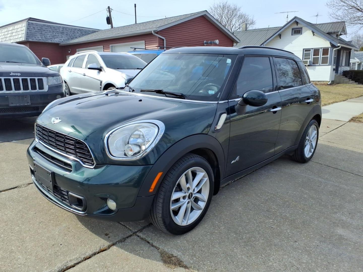2013 Oxford Green Metallic MINI Countryman Cooper S ALL4 (WMWZC5C59DW) with an 1.6L 1.6L Turbo I4 181hp 177ft. lbs. Direct Injection engine, 6-Speed Shiftable Automatic transmission, located at 5505 N. Summit St., Toledo, OH, 43611, (419) 729-2688, 41.654953, -83.530014 - Photo#20