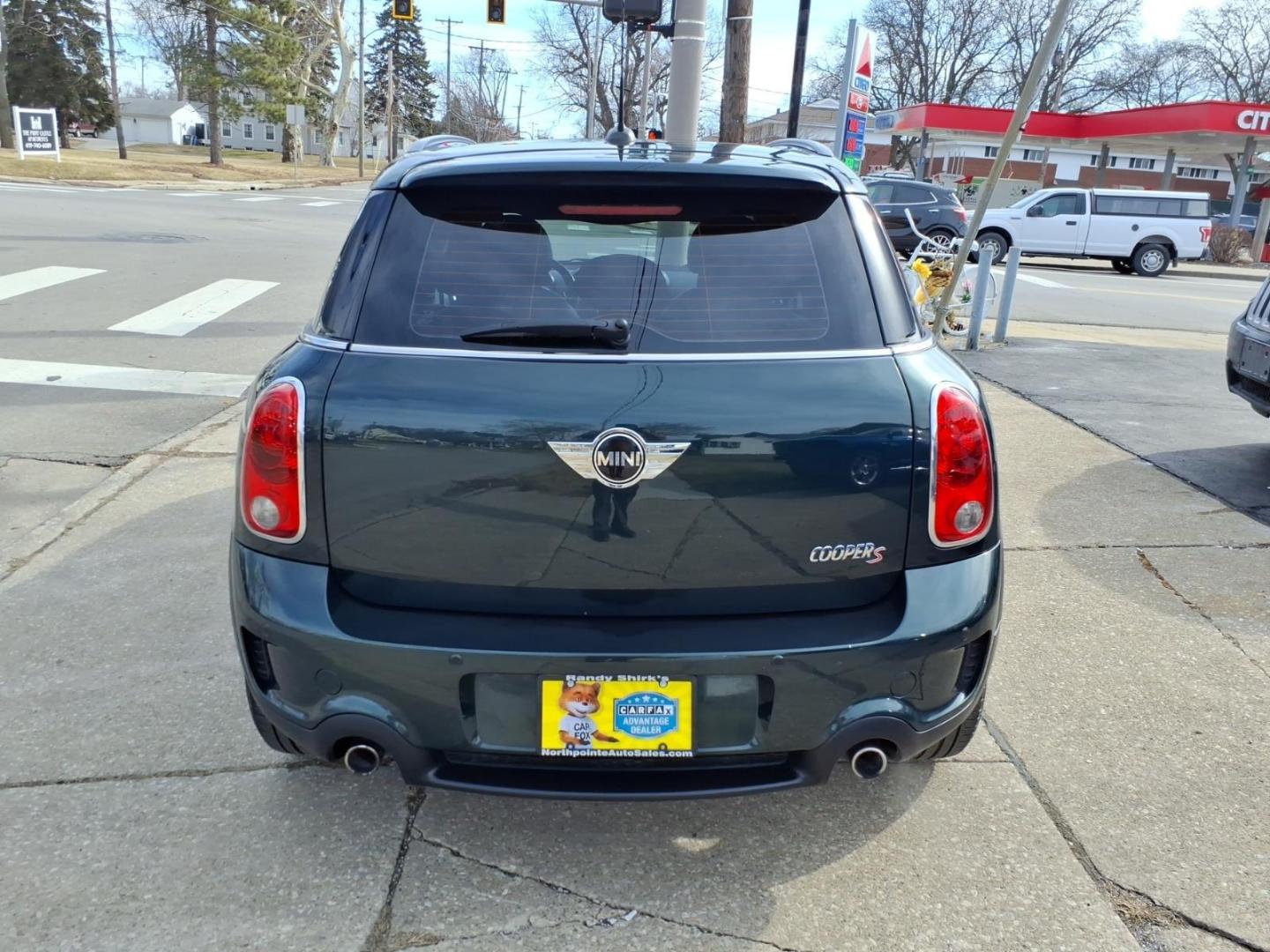 2013 Oxford Green Metallic MINI Countryman Cooper S ALL4 (WMWZC5C59DW) with an 1.6L 1.6L Turbo I4 181hp 177ft. lbs. Direct Injection engine, 6-Speed Shiftable Automatic transmission, located at 5505 N. Summit St., Toledo, OH, 43611, (419) 729-2688, 41.654953, -83.530014 - Photo#23