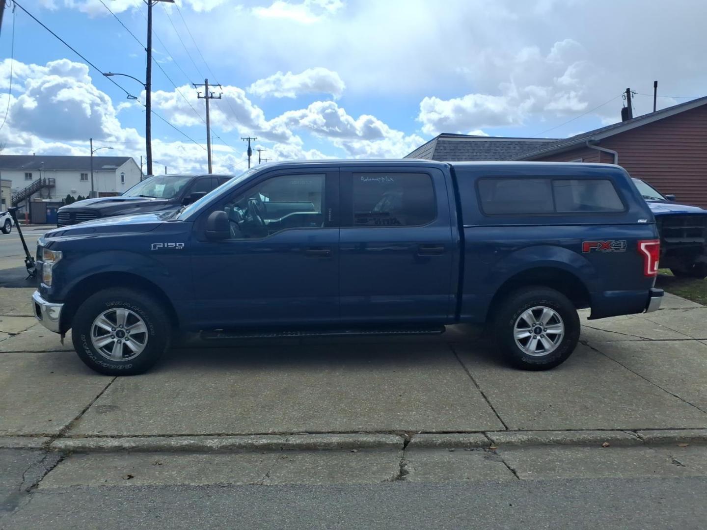 2016 Blue Jeans Metallic Ford F-150 XLT (1FTEW1EF1GF) with an 5.0L 5.0L Flex Fuel V8 385hp 387ft. lbs. Sequential Multiport Fuel Injection engine, 6-Speed Shiftable Automatic transmission, located at 5505 N. Summit St., Toledo, OH, 43611, (419) 729-2688, 41.654953, -83.530014 - Photo#12