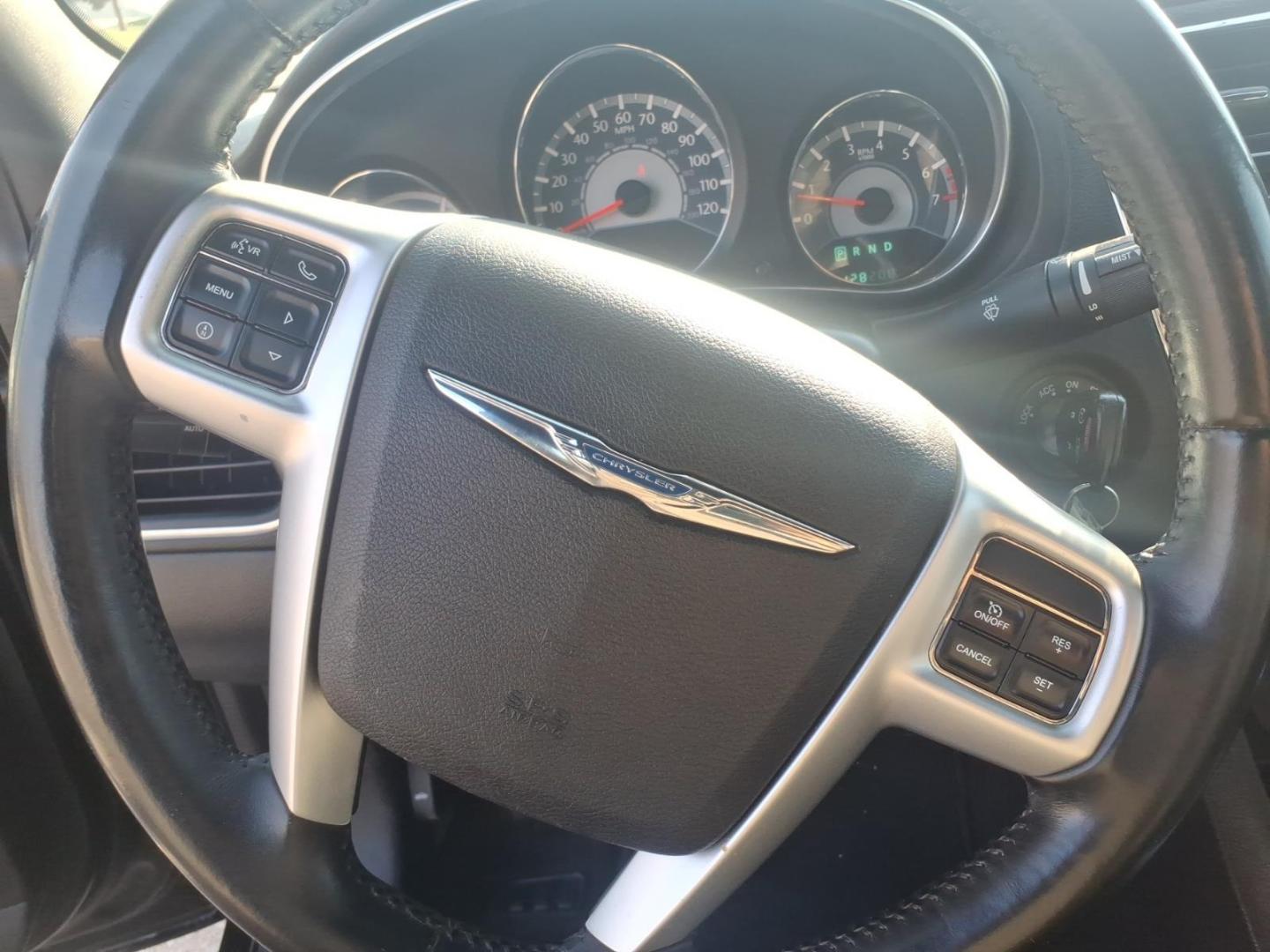 2013 Black Clear Coat Chrysler 200 Limited (1C3CCBCG6DN) with an 3.6L Pentastar 3.6L Flex Fuel V6 283hp 260ft. lbs. Sequential Multiport Fuel Injection engine, 6-Speed Shiftable Automatic transmission, located at 5505 N. Summit St., Toledo, OH, 43611, (419) 729-2688, 41.654953, -83.530014 - Photo#3