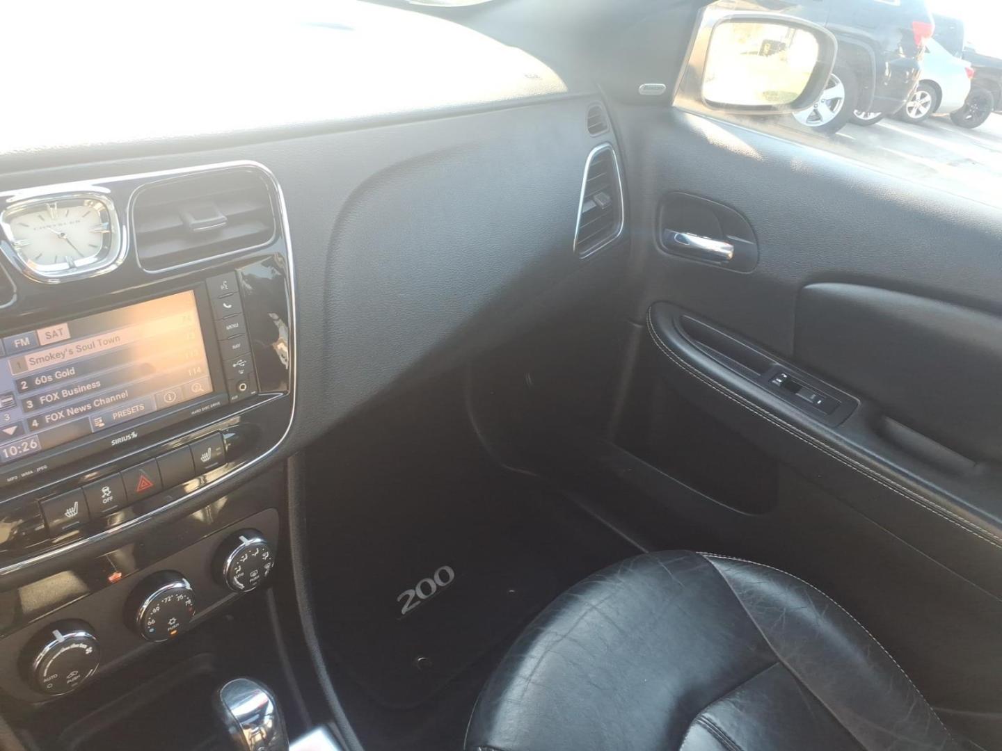 2013 Black Clear Coat Chrysler 200 Limited (1C3CCBCG6DN) with an 3.6L Pentastar 3.6L Flex Fuel V6 283hp 260ft. lbs. Sequential Multiport Fuel Injection engine, 6-Speed Shiftable Automatic transmission, located at 5505 N. Summit St., Toledo, OH, 43611, (419) 729-2688, 41.654953, -83.530014 - Photo#9