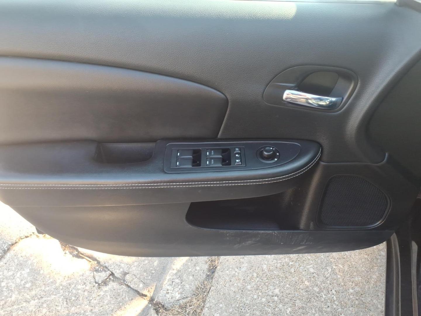 2013 Black Clear Coat Chrysler 200 Limited (1C3CCBCG6DN) with an 3.6L Pentastar 3.6L Flex Fuel V6 283hp 260ft. lbs. Sequential Multiport Fuel Injection engine, 6-Speed Shiftable Automatic transmission, located at 5505 N. Summit St., Toledo, OH, 43611, (419) 729-2688, 41.654953, -83.530014 - Photo#12