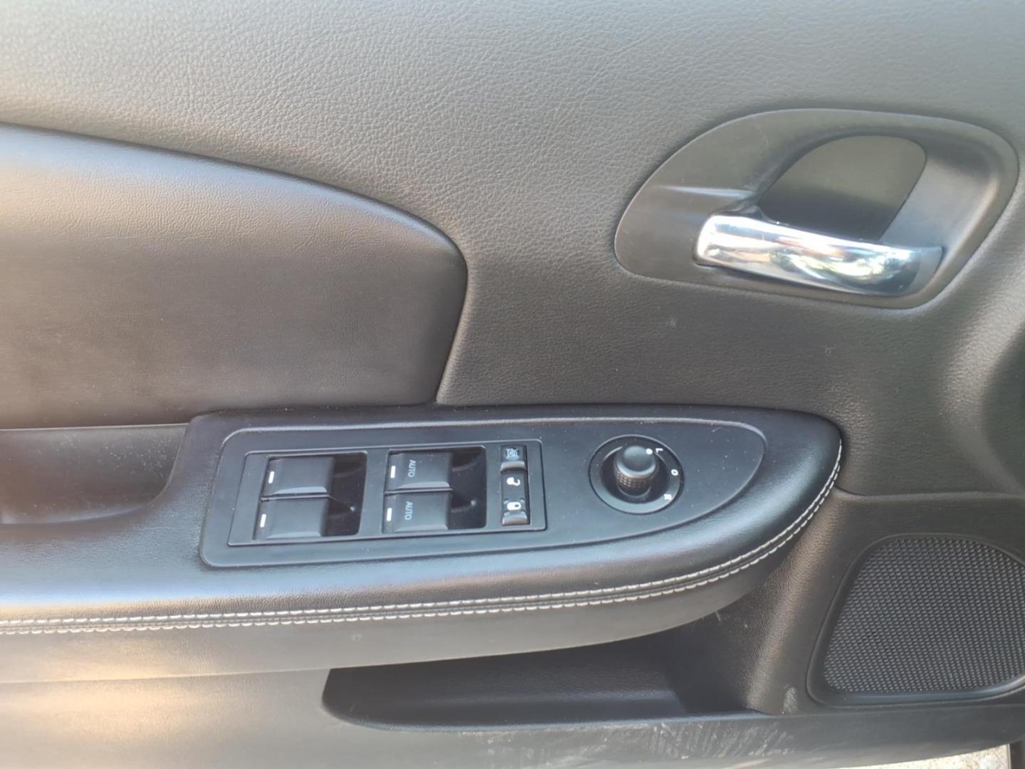 2013 Black Clear Coat Chrysler 200 Limited (1C3CCBCG6DN) with an 3.6L Pentastar 3.6L Flex Fuel V6 283hp 260ft. lbs. Sequential Multiport Fuel Injection engine, 6-Speed Shiftable Automatic transmission, located at 5505 N. Summit St., Toledo, OH, 43611, (419) 729-2688, 41.654953, -83.530014 - Photo#13