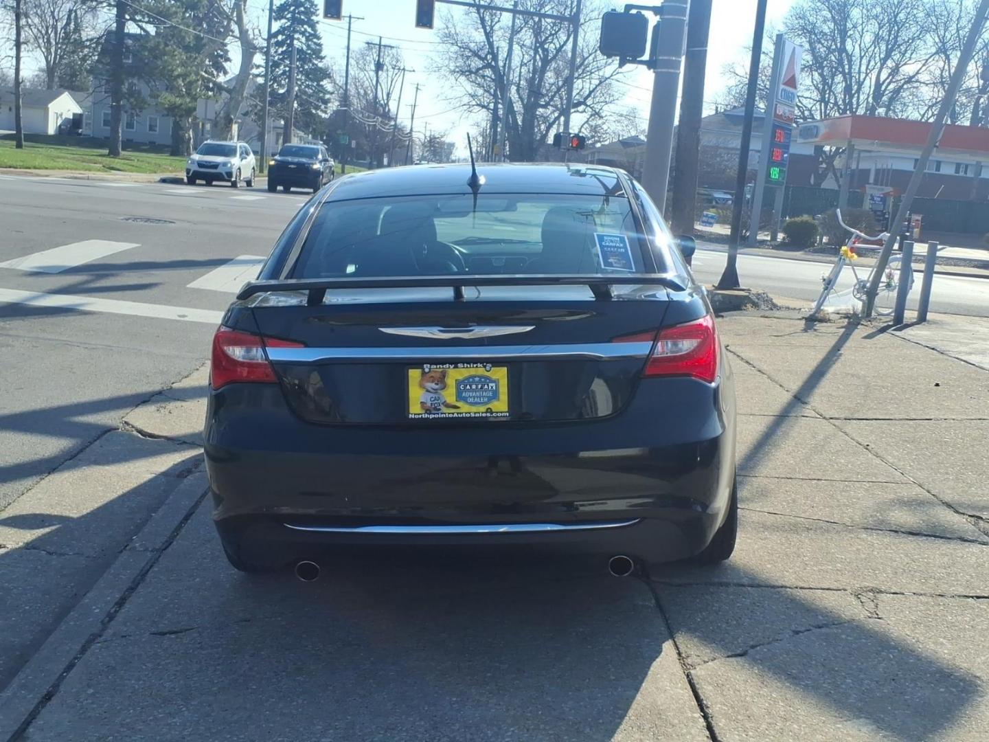 2013 Black Clear Coat Chrysler 200 Limited (1C3CCBCG6DN) with an 3.6L Pentastar 3.6L Flex Fuel V6 283hp 260ft. lbs. Sequential Multiport Fuel Injection engine, 6-Speed Shiftable Automatic transmission, located at 5505 N. Summit St., Toledo, OH, 43611, (419) 729-2688, 41.654953, -83.530014 - Photo#18