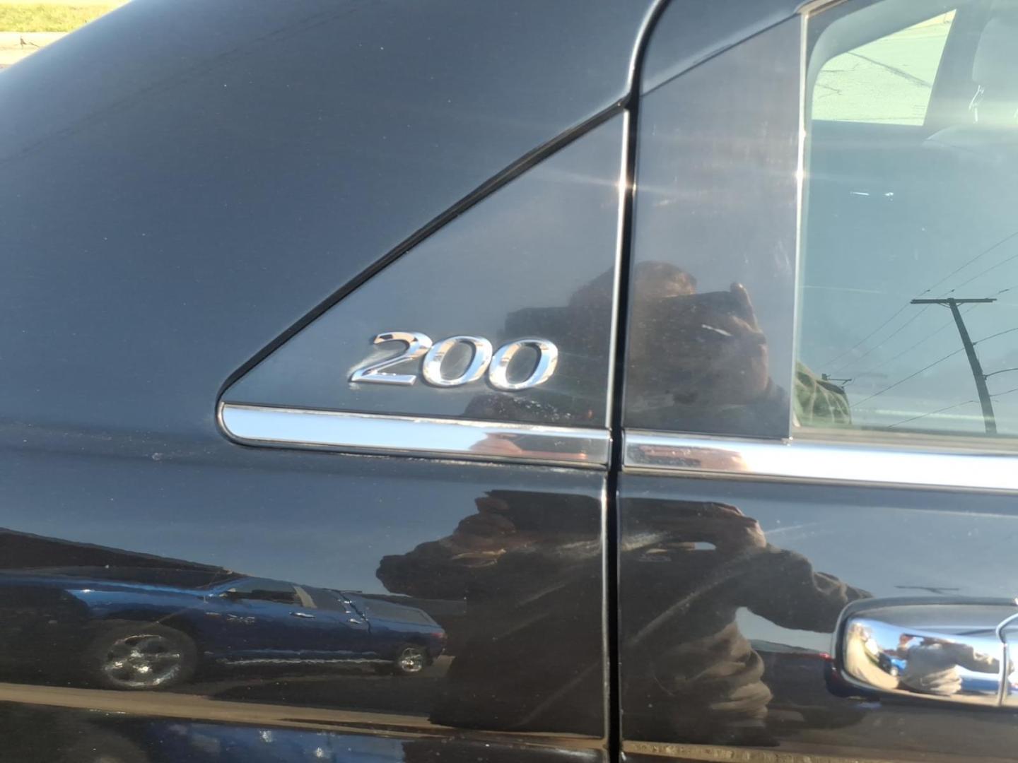 2013 Black Clear Coat Chrysler 200 Limited (1C3CCBCG6DN) with an 3.6L Pentastar 3.6L Flex Fuel V6 283hp 260ft. lbs. Sequential Multiport Fuel Injection engine, 6-Speed Shiftable Automatic transmission, located at 5505 N. Summit St., Toledo, OH, 43611, (419) 729-2688, 41.654953, -83.530014 - Photo#25