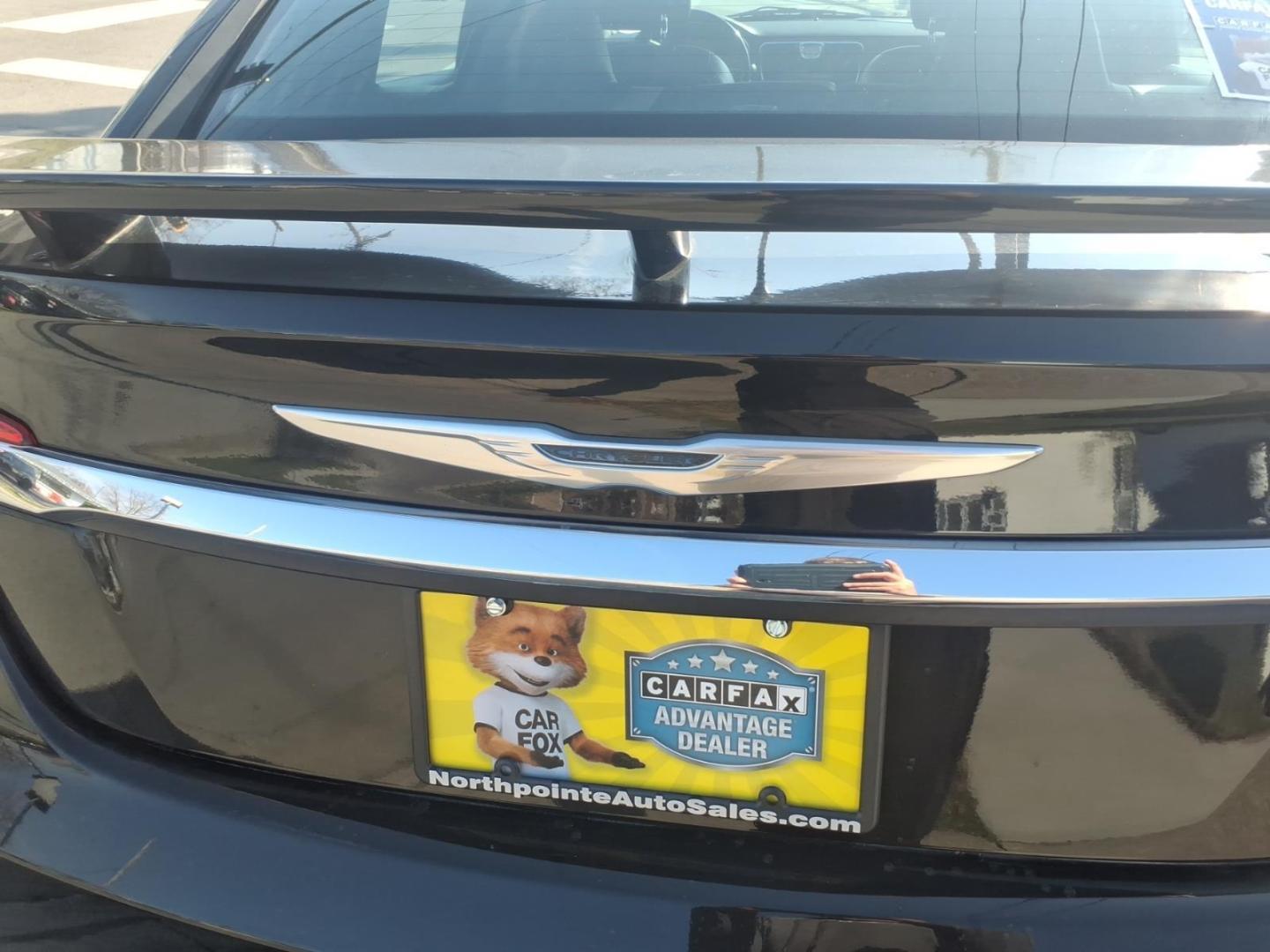 2013 Black Clear Coat Chrysler 200 Limited (1C3CCBCG6DN) with an 3.6L Pentastar 3.6L Flex Fuel V6 283hp 260ft. lbs. Sequential Multiport Fuel Injection engine, 6-Speed Shiftable Automatic transmission, located at 5505 N. Summit St., Toledo, OH, 43611, (419) 729-2688, 41.654953, -83.530014 - Photo#26