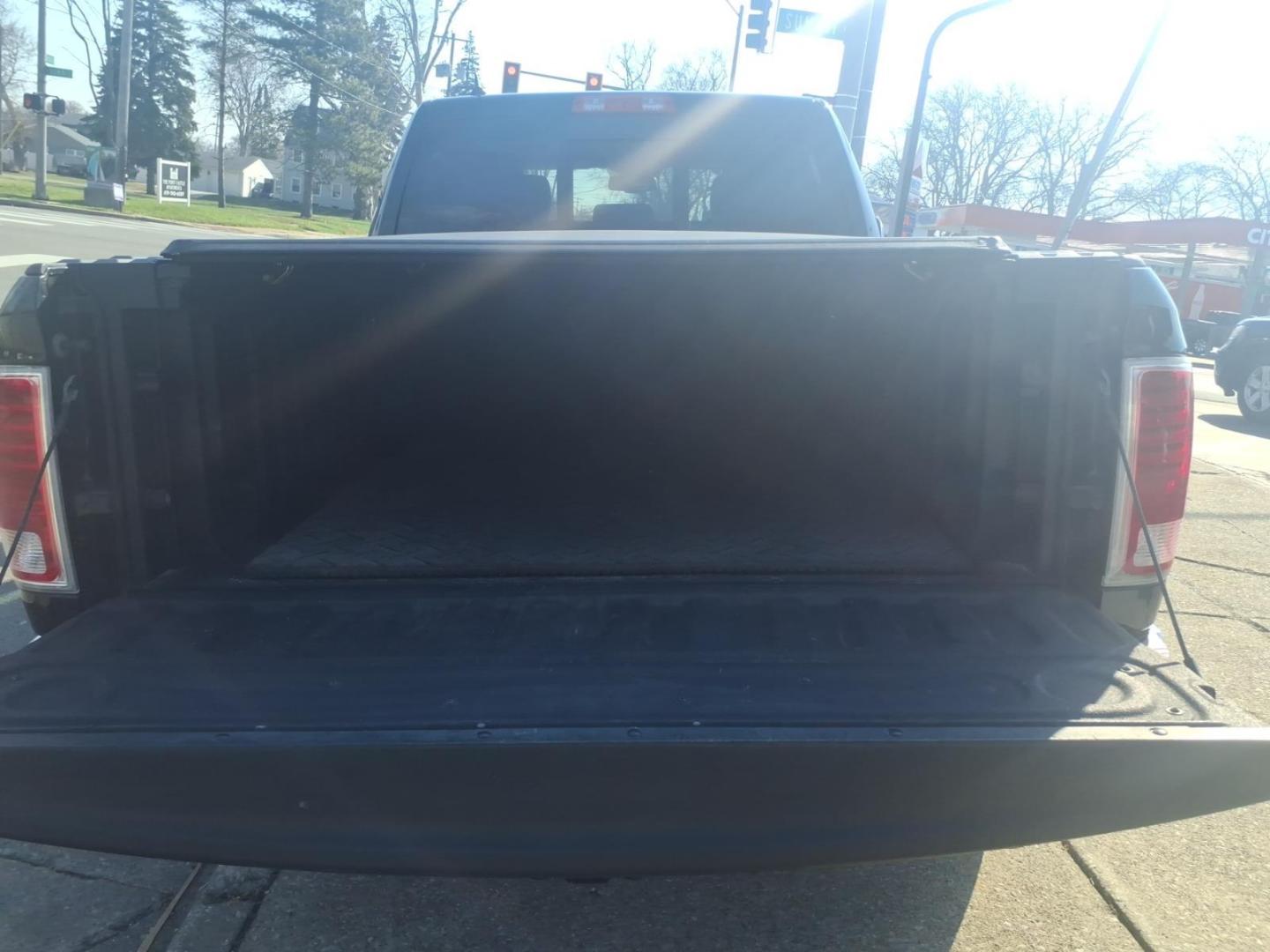 2015 Brilliant Black Crystal Pearl Coat/Bright Silver M RAM 1500 Laramie (1C6RR7VT0FS) with an 5.7L HEMI 5.7L V8 395hp 410ft. lbs. Sequential Multiport Fuel Injection engine, 8-Speed Shiftable Automatic transmission, located at 5505 N. Summit St., Toledo, OH, 43611, (419) 729-2688, 41.654953, -83.530014 - Photo#22