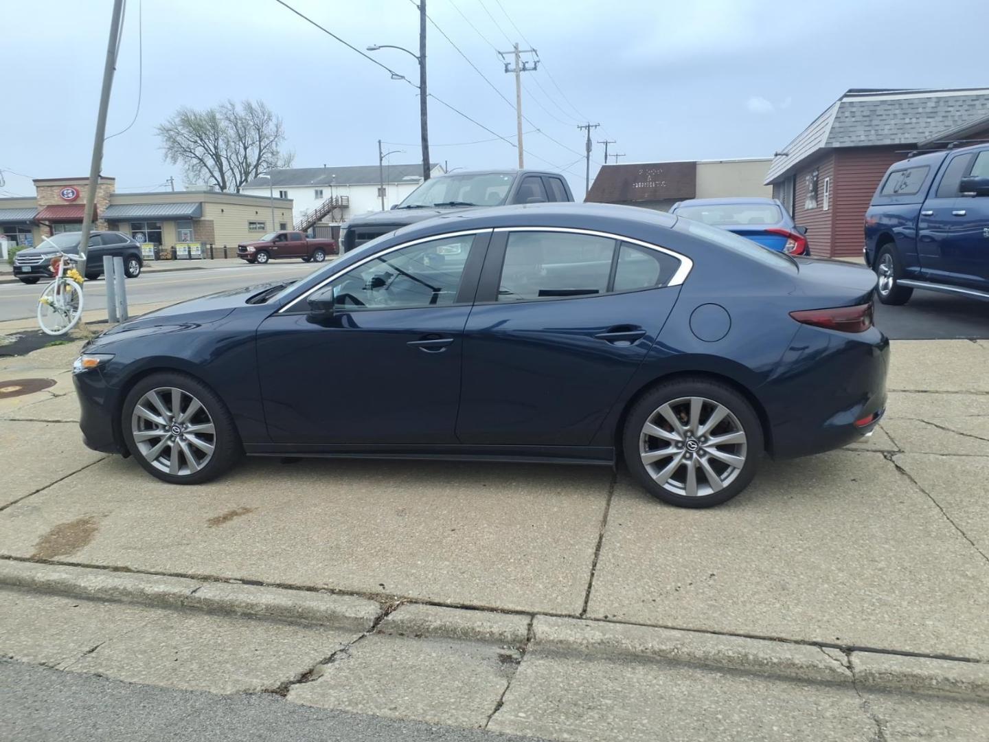 2021 Deep Crystal Blue Mica 42m Mazda Mazda3 Sedan Preferred (JM1BPBCL5M1) with an 2.5L SKYACTIV-G 2.5L I4 186hp 186ft. lbs. Direct Injection engine, 6-Speed Shiftable Automatic w/Sport Transmission transmission, located at 5505 N. Summit St., Toledo, OH, 43611, (419) 729-2688, 41.654953, -83.530014 - Photo#19