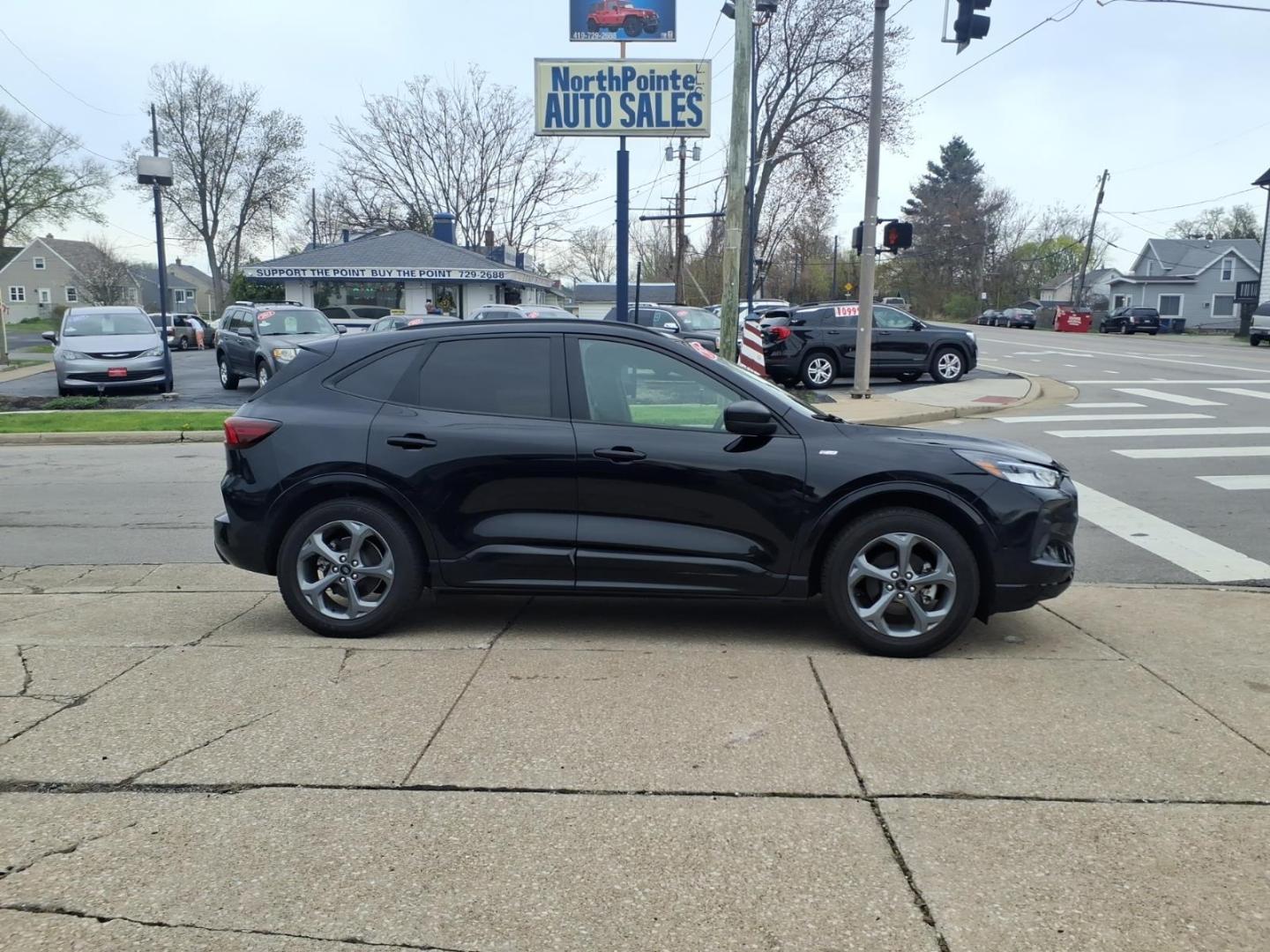 2023 Agate Black Um Ford Escape ST-Line (1FMCU0MNXPU) with an 1.5L EcoBoost 1.5L Turbo I3 180hp 199ft. lbs. Direct Injection engine, 8-Speed Shiftable Automatic transmission, located at 5505 N. Summit St., Toledo, OH, 43611, (419) 729-2688, 41.654953, -83.530014 - Photo#0