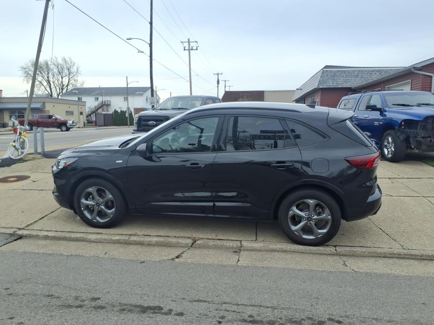 2023 Agate Black Um Ford Escape ST-Line (1FMCU0MNXPU) with an 1.5L EcoBoost 1.5L Turbo I3 180hp 199ft. lbs. Direct Injection engine, 8-Speed Shiftable Automatic transmission, located at 5505 N. Summit St., Toledo, OH, 43611, (419) 729-2688, 41.654953, -83.530014 - Photo#16