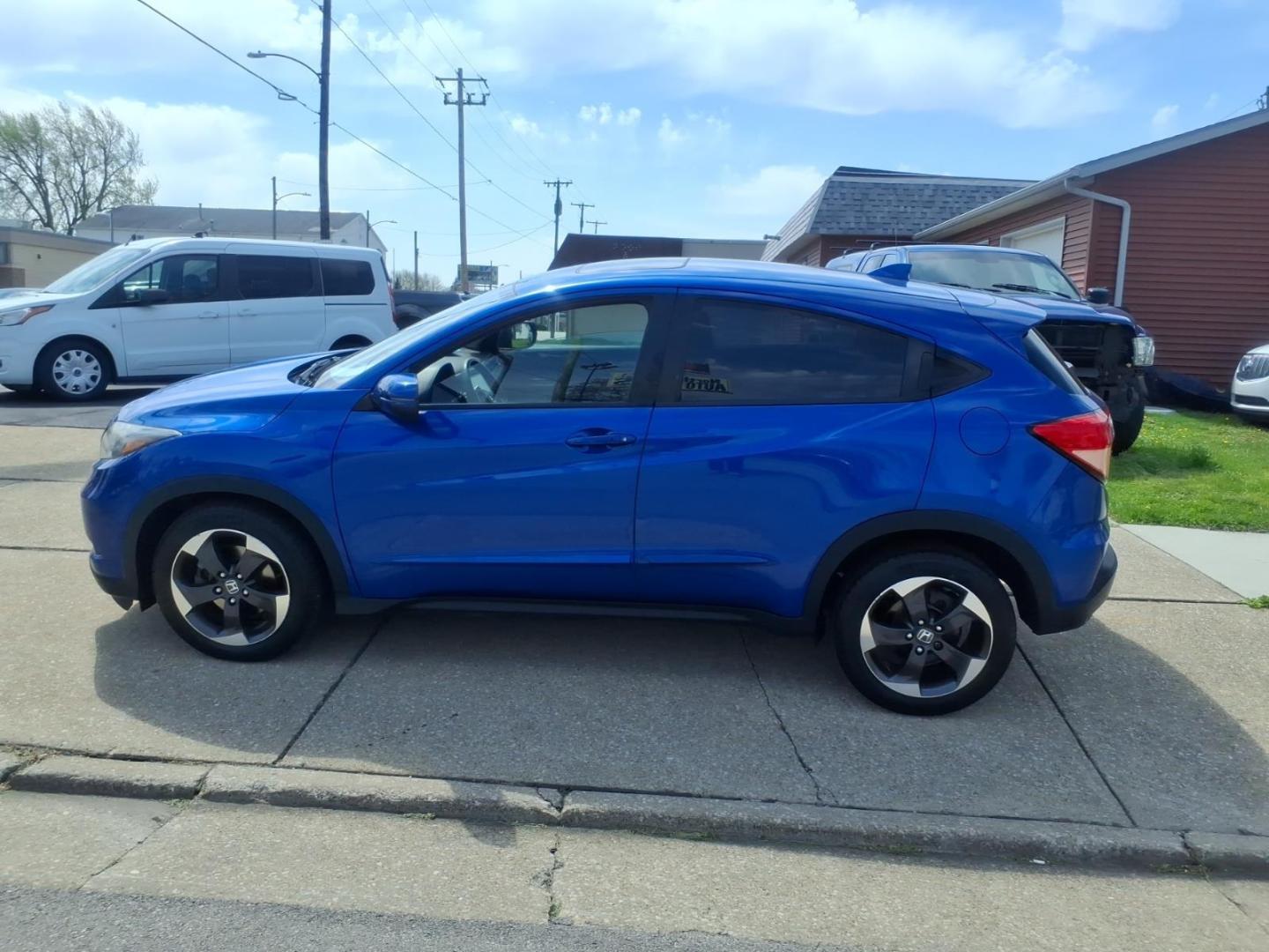 2018 Aegean Blue Metallic Bs Honda HR-V EX (3CZRU6H52JG) with an 1.8L 1.8L I4 141hp 127ft. lbs. Sequential Multiport Fuel Injection engine, 7-Speed Shiftable CVT transmission, located at 5505 N. Summit St., Toledo, OH, 43611, (419) 729-2688, 41.654953, -83.530014 - Photo#18