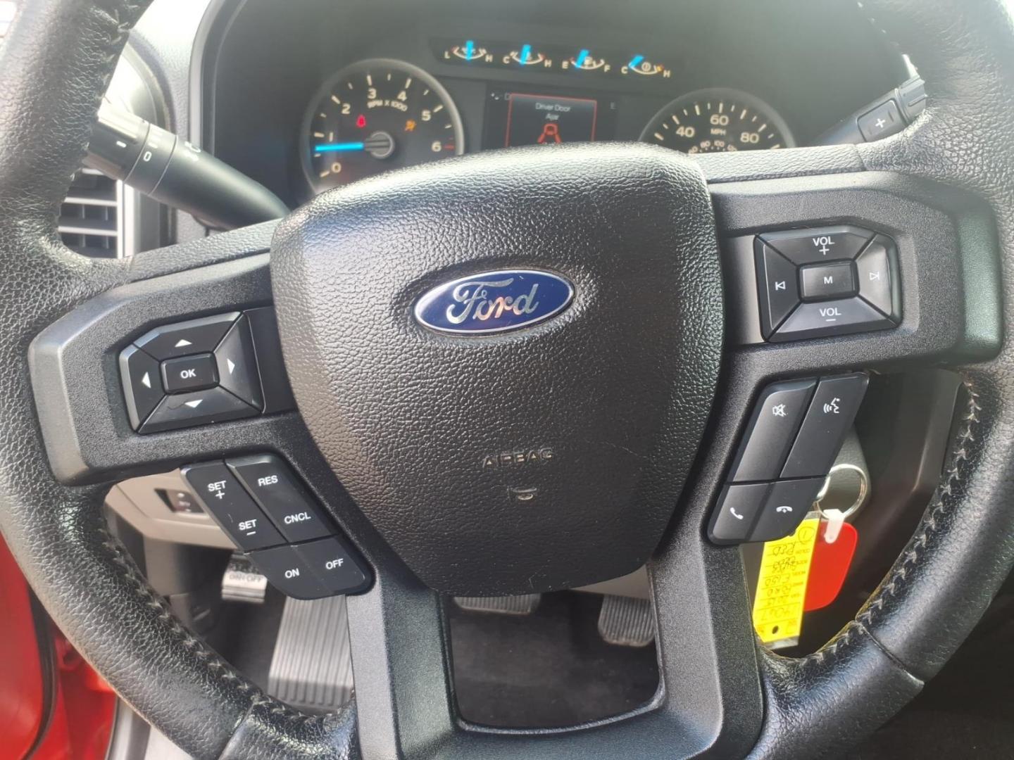 2015 Race Red Ford F-150 XLT (1FTFW1EG8FK) with an 3.5L EcoBoost 3.5L Twin Turbo V6 365hp 420ft. lbs. Direct Injection engine, 6-Speed Shiftable Automatic transmission, located at 5505 N. Summit St., Toledo, OH, 43611, (419) 729-2688, 41.654953, -83.530014 - Photo#4