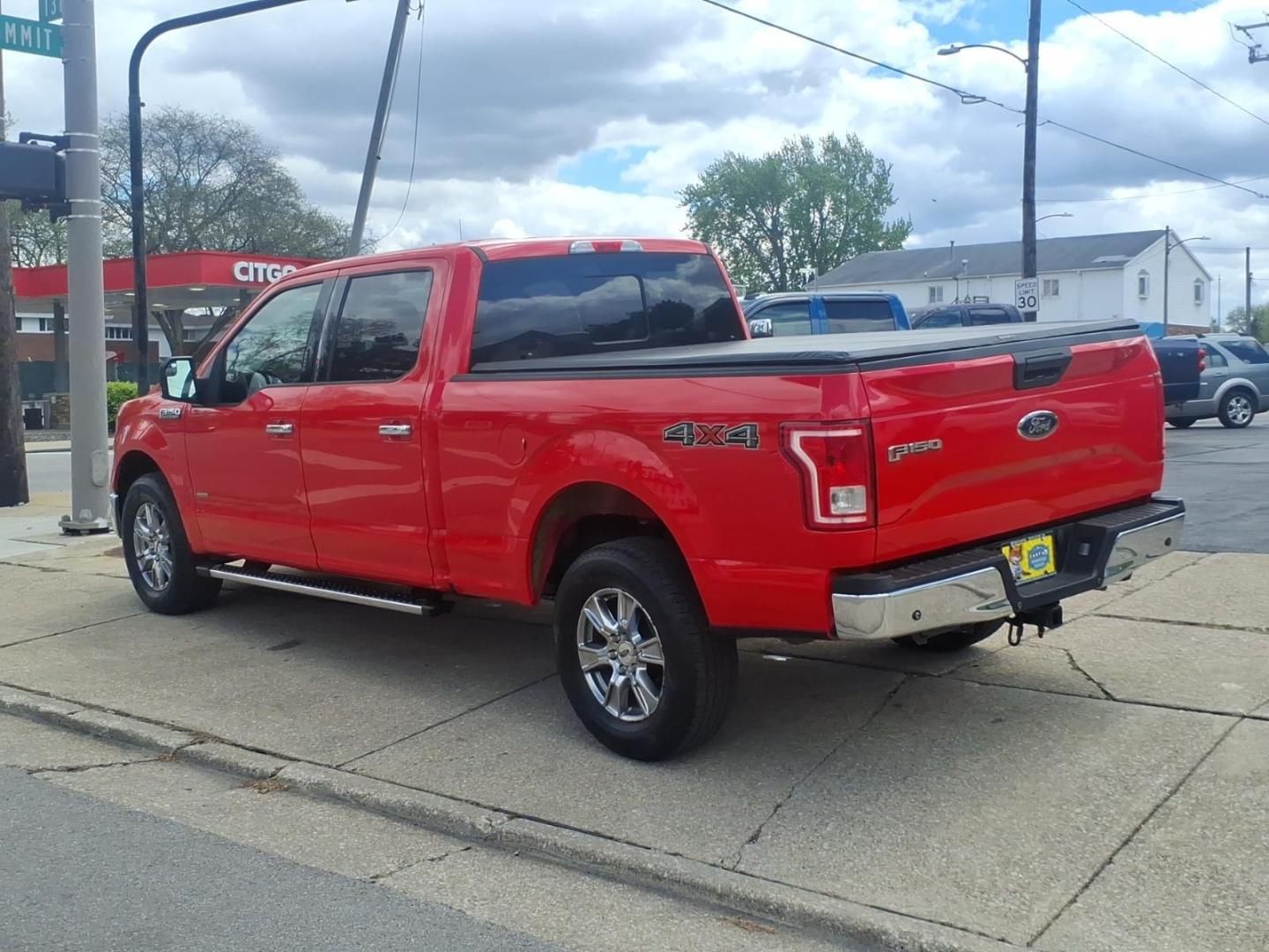 2015 Race Red Ford F-150 XLT (1FTFW1EG8FK) with an 3.5L EcoBoost 3.5L Twin Turbo V6 365hp 420ft. lbs. Direct Injection engine, 6-Speed Shiftable Automatic transmission, located at 5505 N. Summit St., Toledo, OH, 43611, (419) 729-2688, 41.654953, -83.530014 - Photo#16